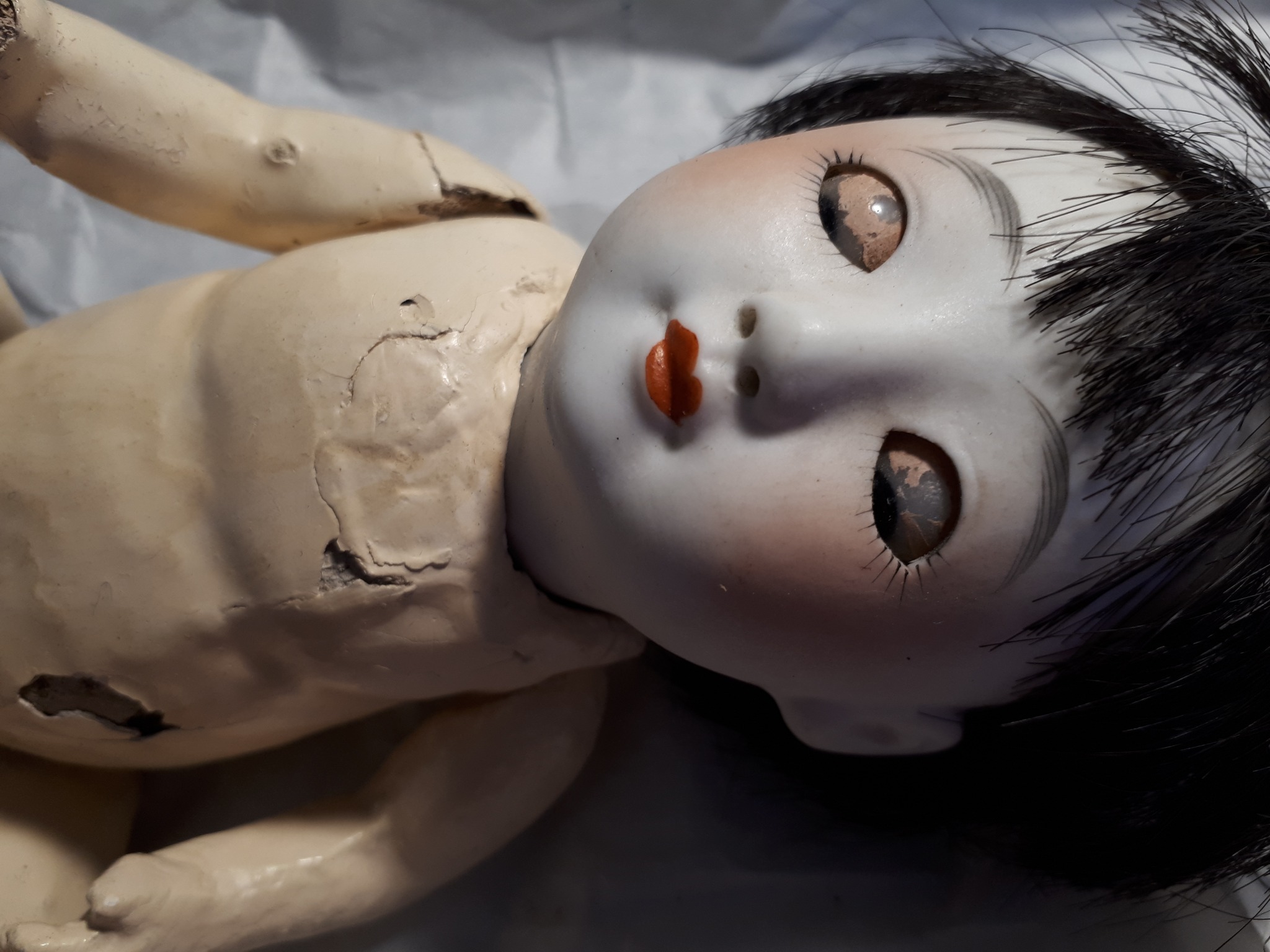 Can someone help me identify this little Asian doll.