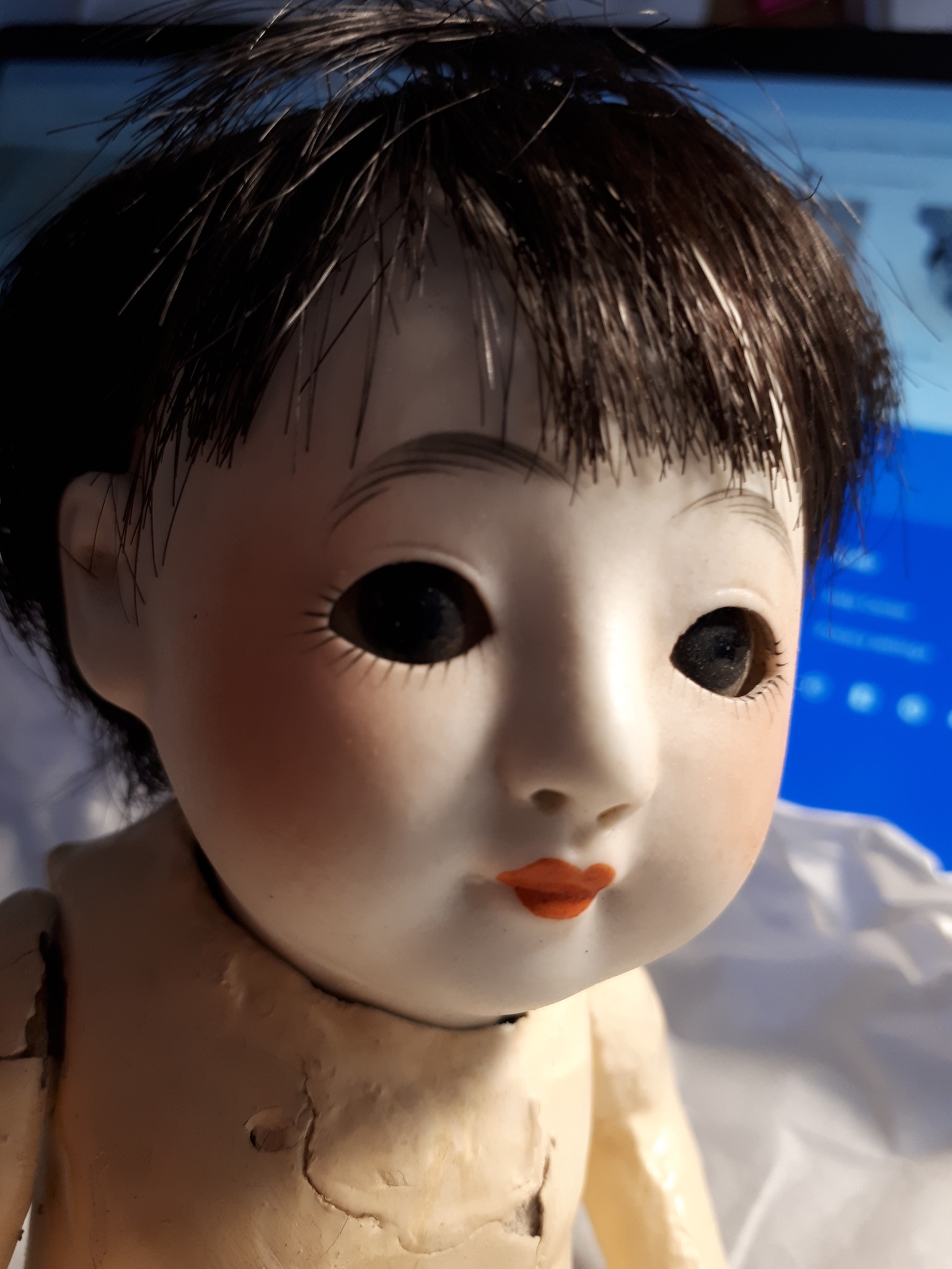 Can someone help me identify this little Asian doll.