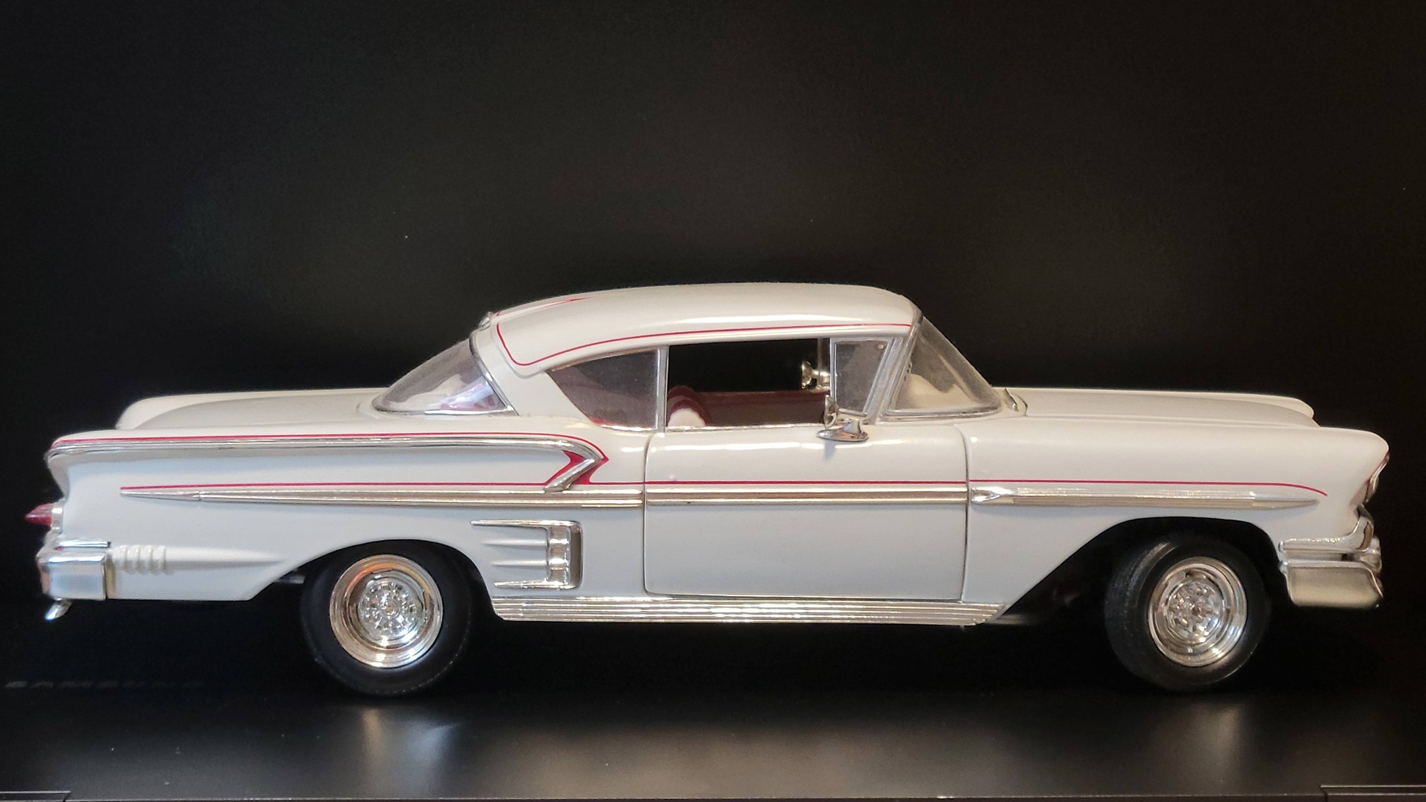 Detailed die-cast metal 1:18 scale model of a 1958 Chevy Impala by