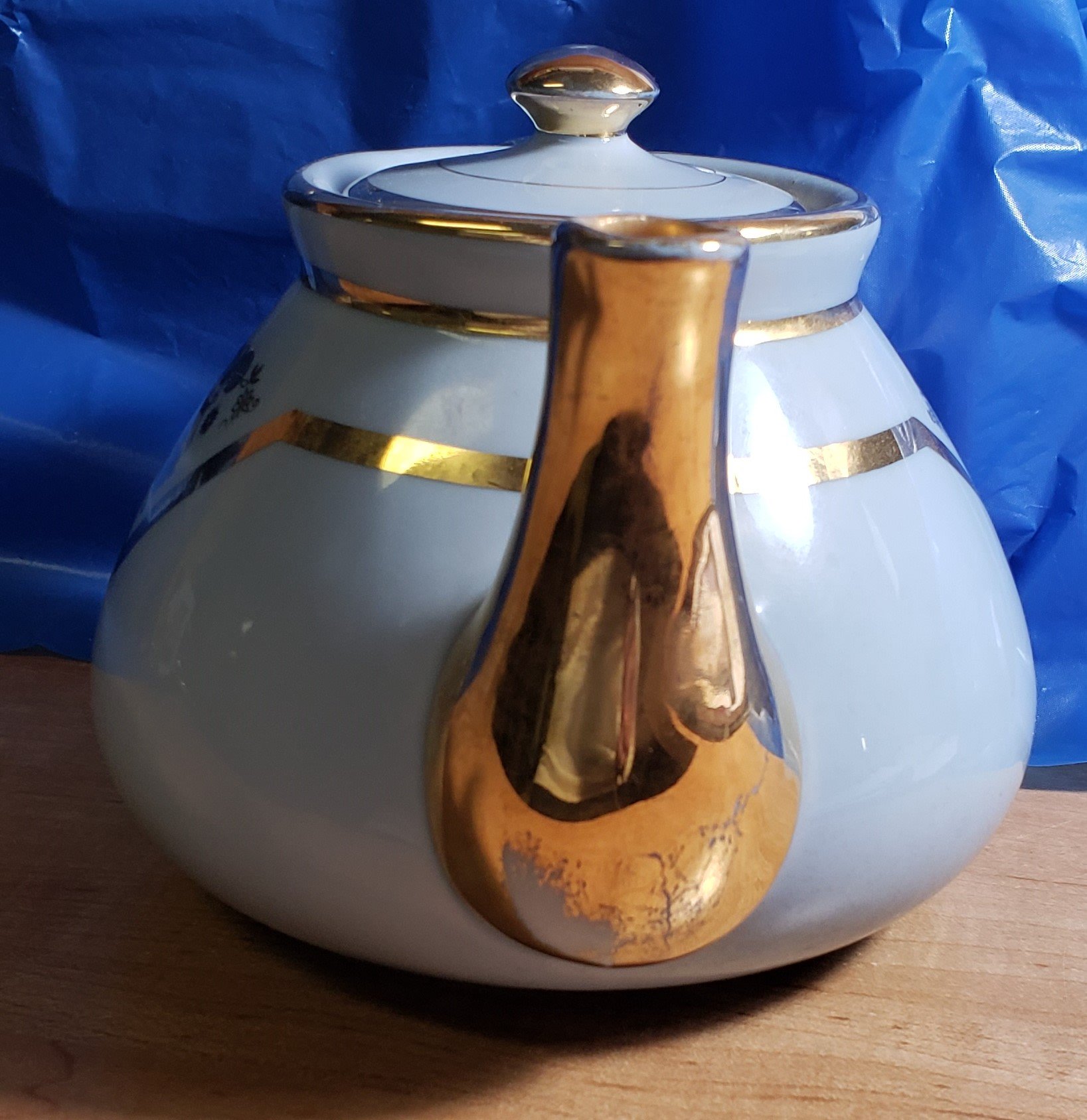 This vintage Fraunfelter Ohio China Co teapot from the 1930s is a 