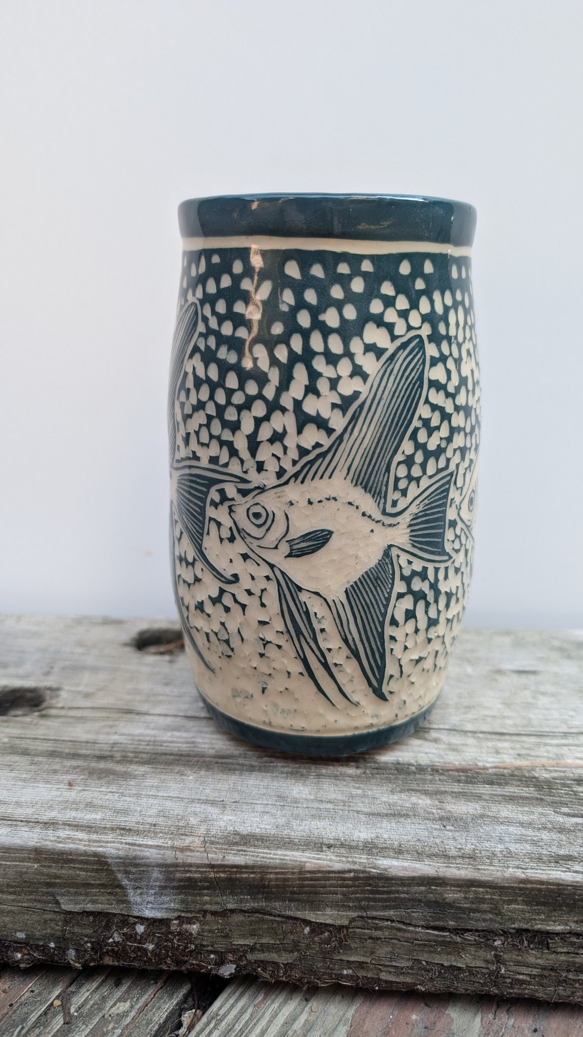 Some ceramic fish-themed things.