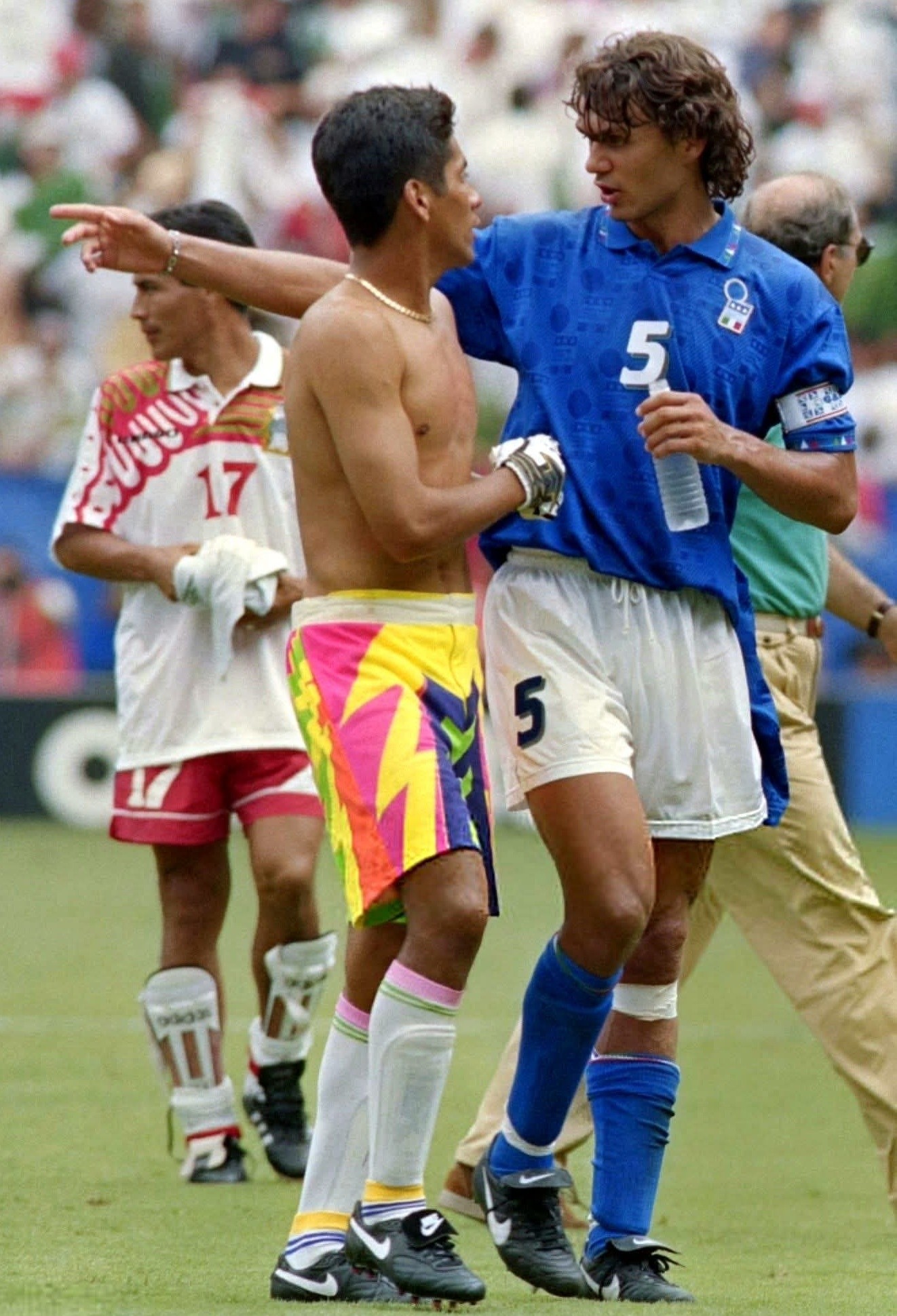 Mexico's Jorge Campos blocks Norway's Jostein Flo at 1994 World
