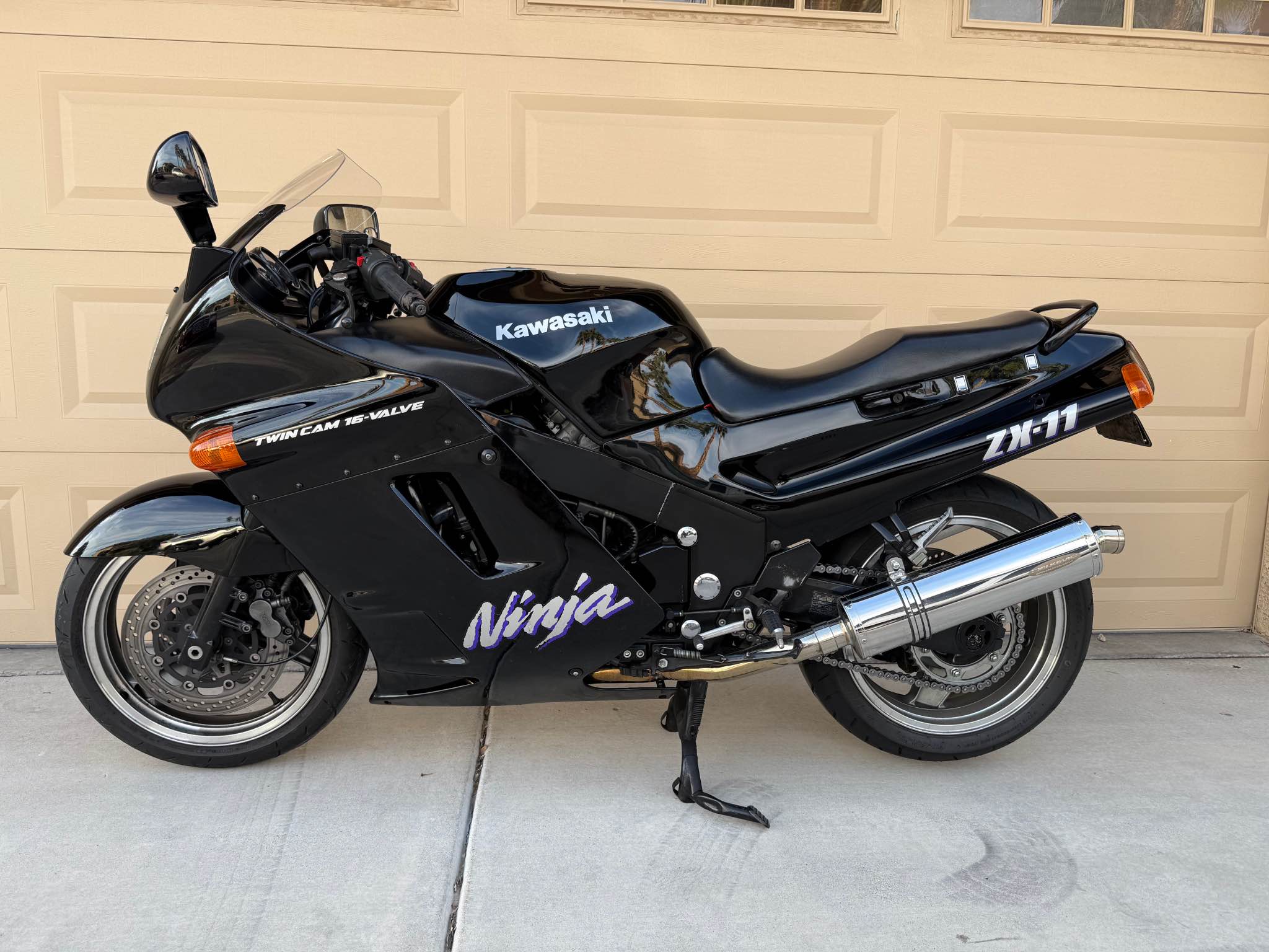1992 Kawasaki KE 100 muffler for sale, excellent condition