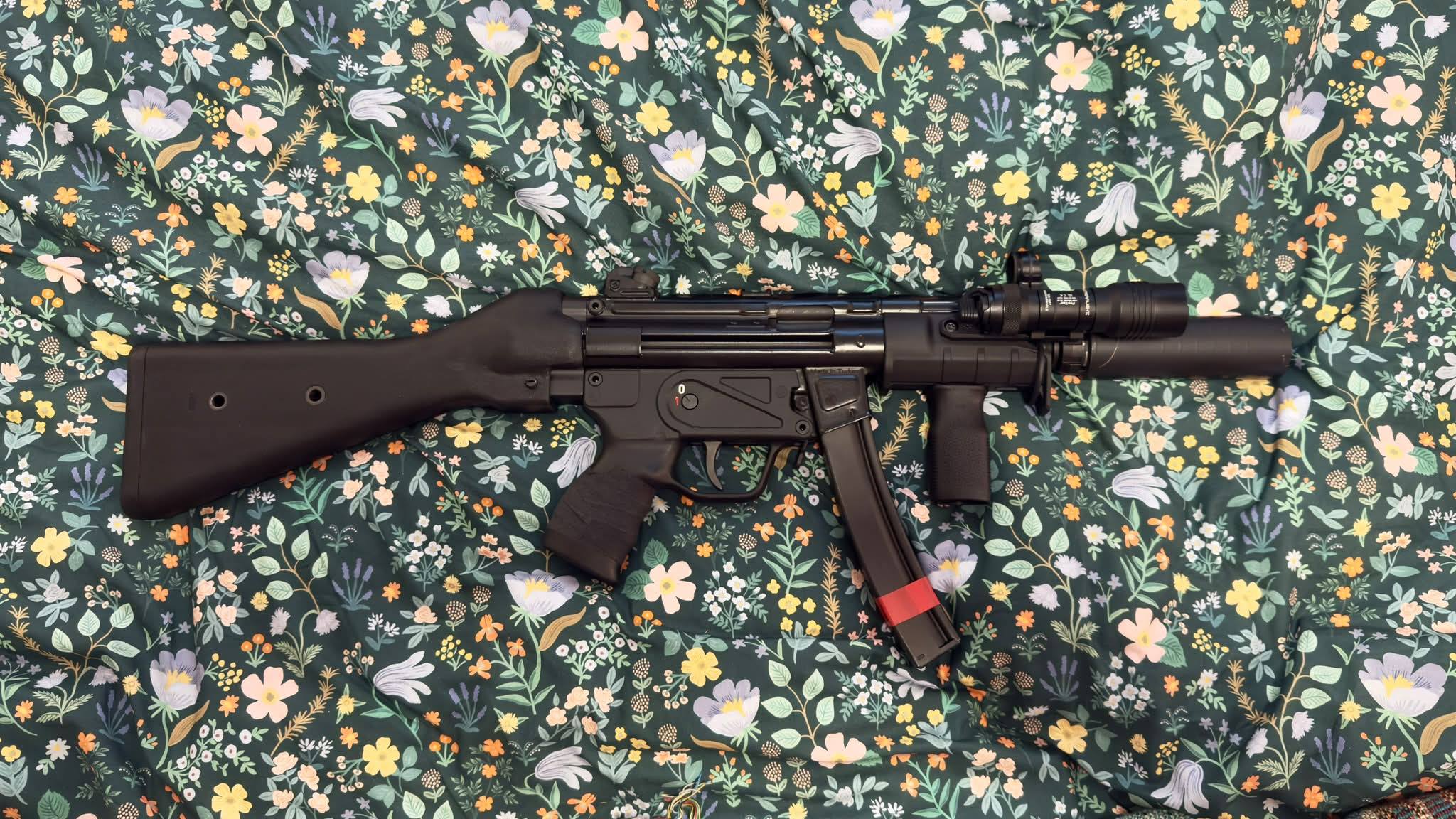 Running an A2 fixed stock on an MP5 clone