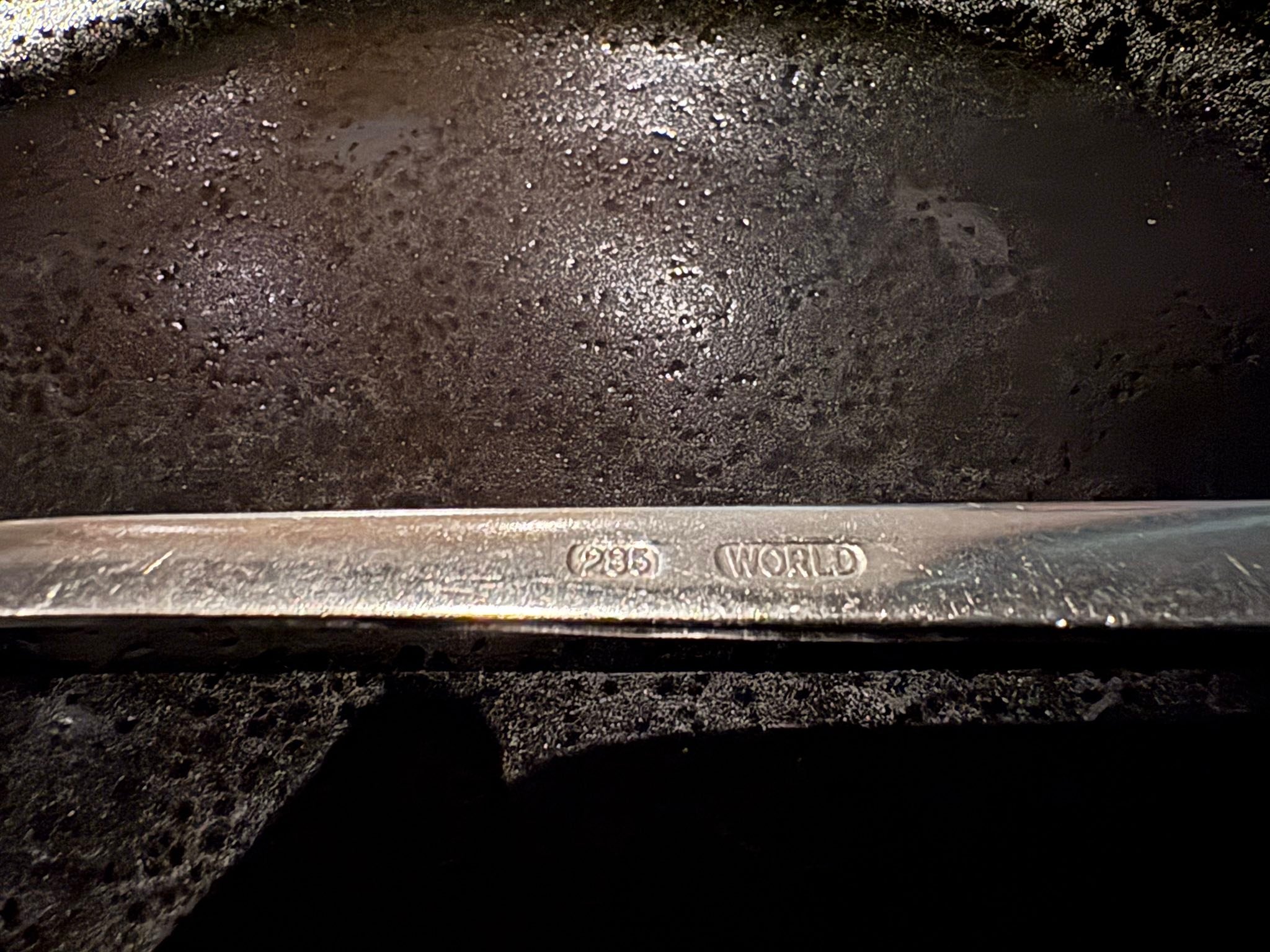 What causes unique manufacturing defects in spoons?