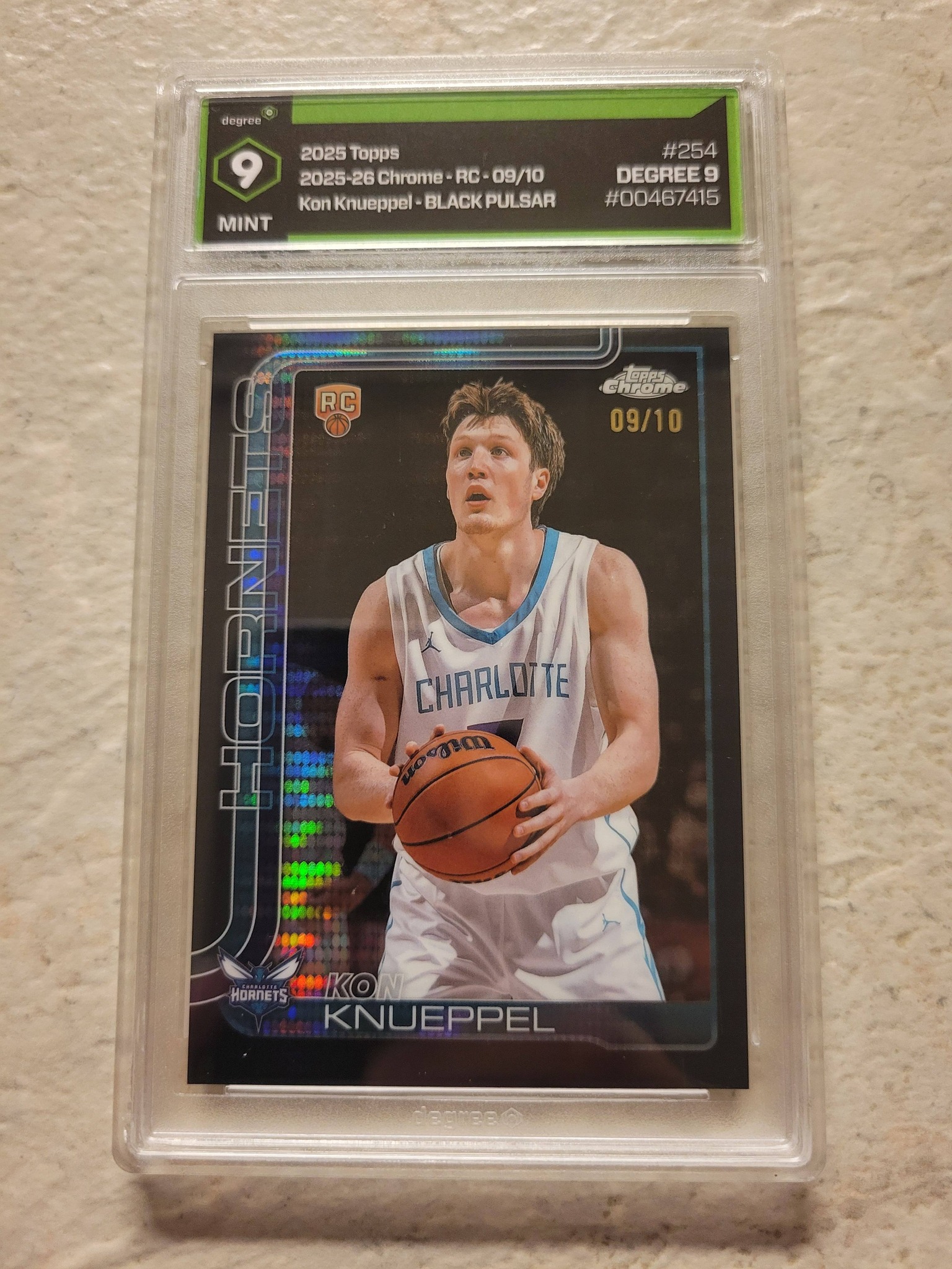 2025-26 Topps Chrome black pulsar refractor numbered /10 Kon 