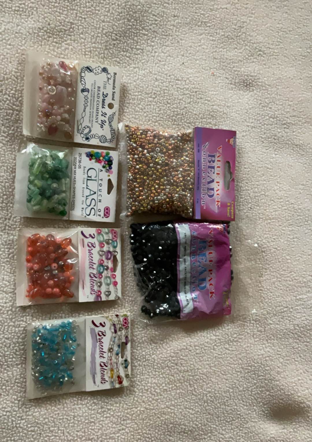 Beads, and more beads, 5 NEW pkgs, as pictured, $5 takes all, pickup village of Fabius
