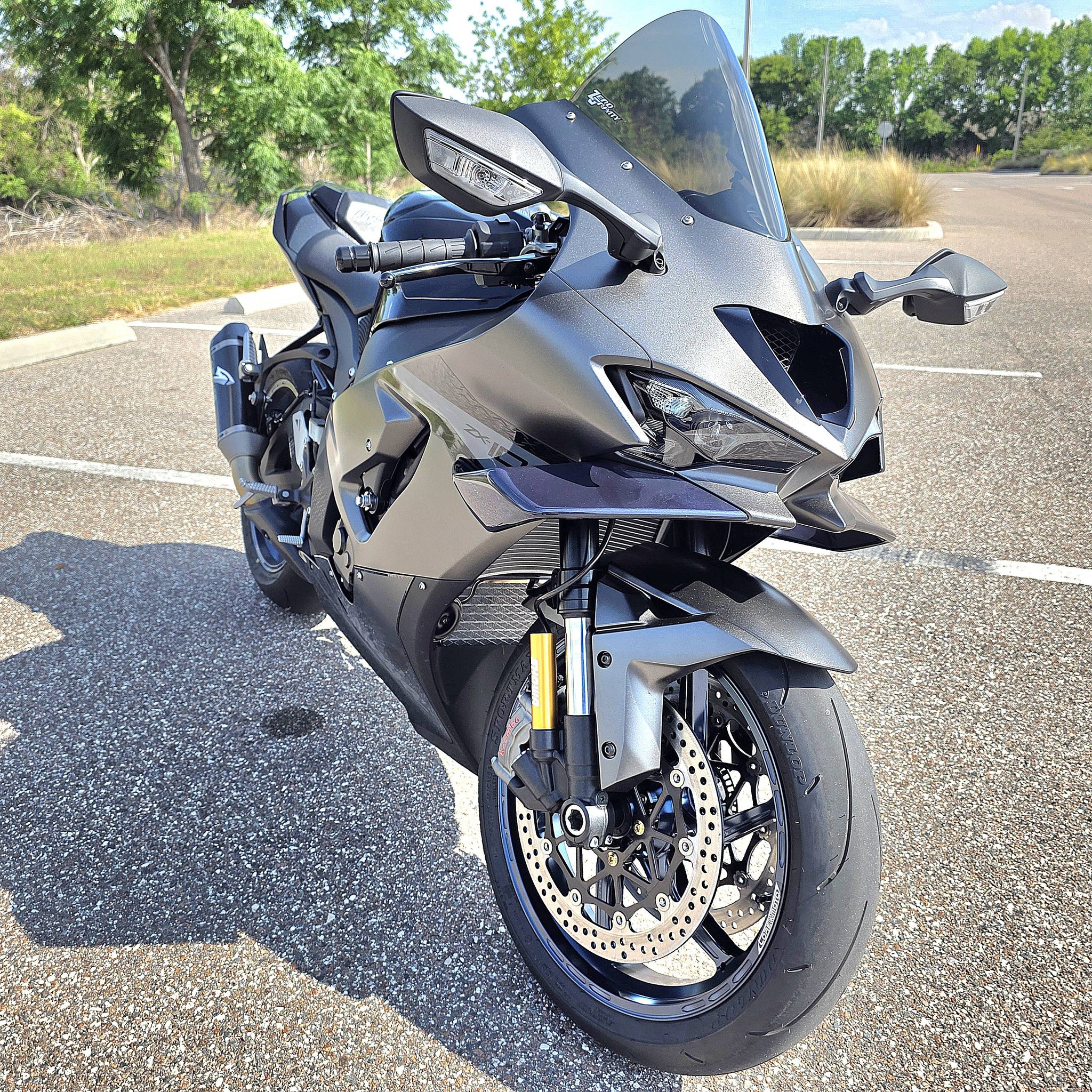 Customizing a Kawasaki ZX10R bike with painted wings and decals