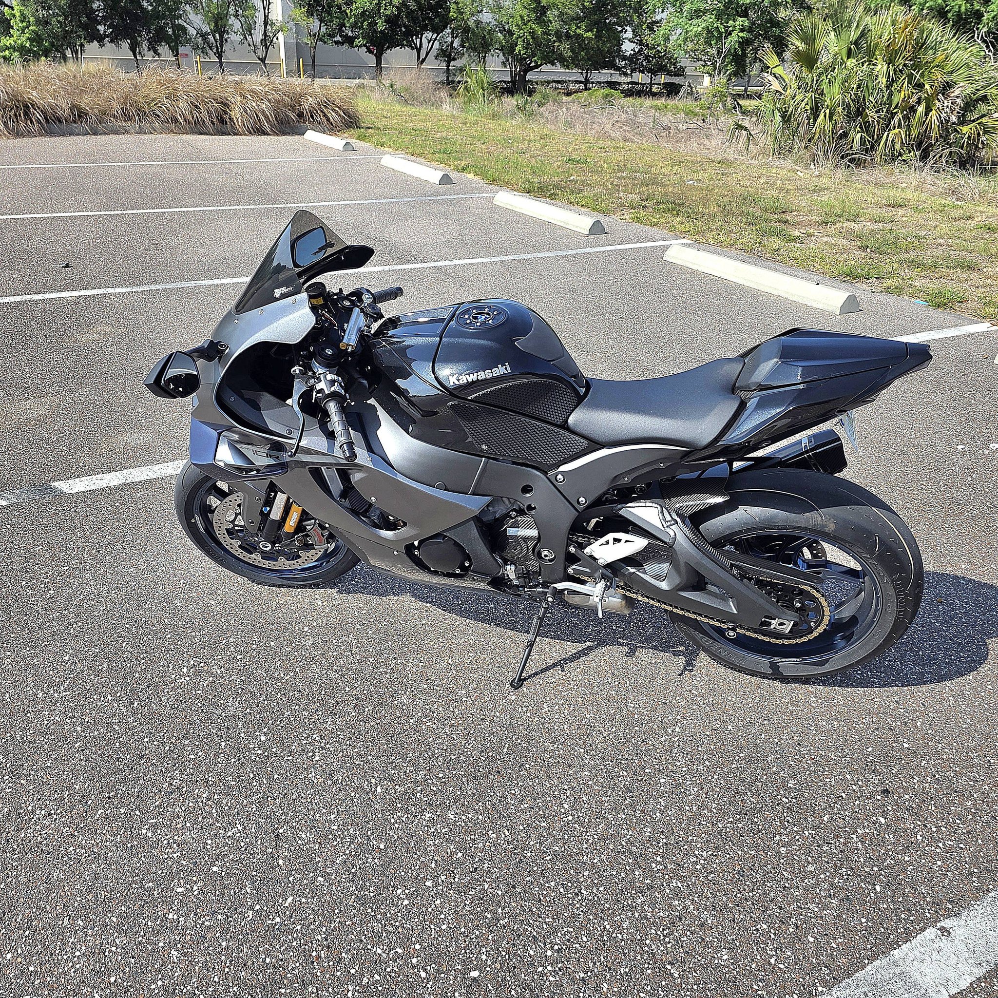 Customizing a Kawasaki ZX10R bike with painted wings and decals