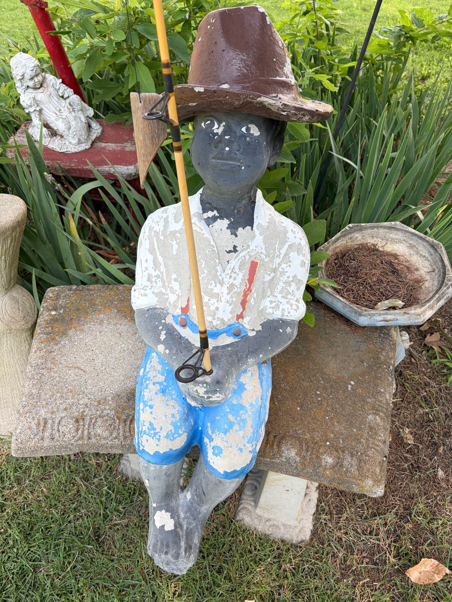 concrete boy with fishing pole Huck Finn Garden Cement Statue Weathered concrete garden statue of