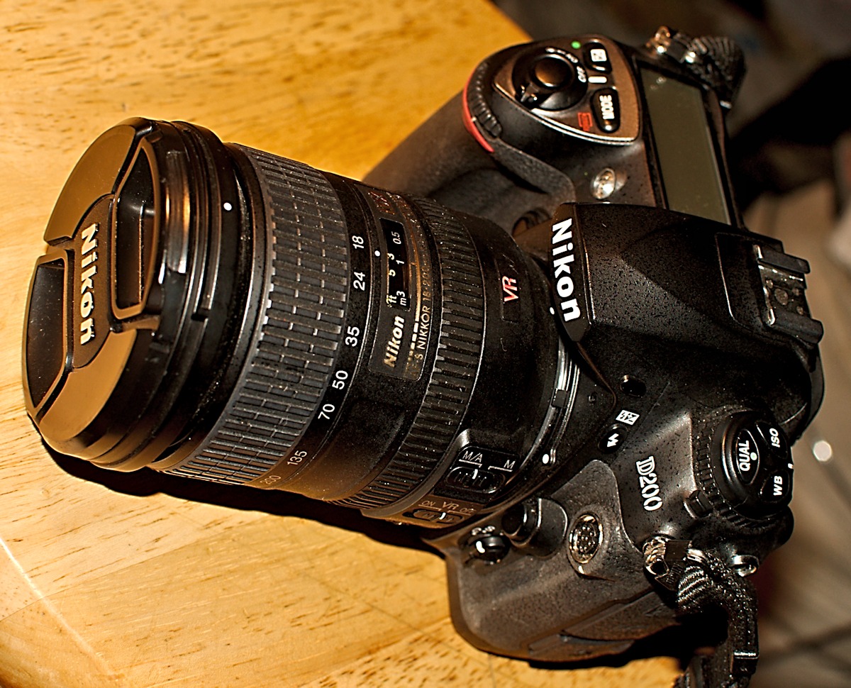Nikon D200 with 18-200mm lens for $50