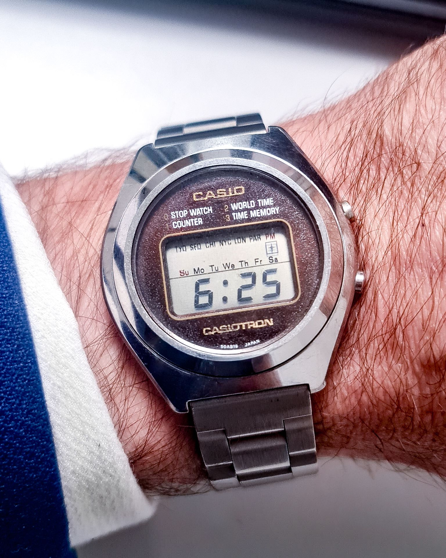 Casiotron X-1R (1976). This one has the textured red/brown dial 