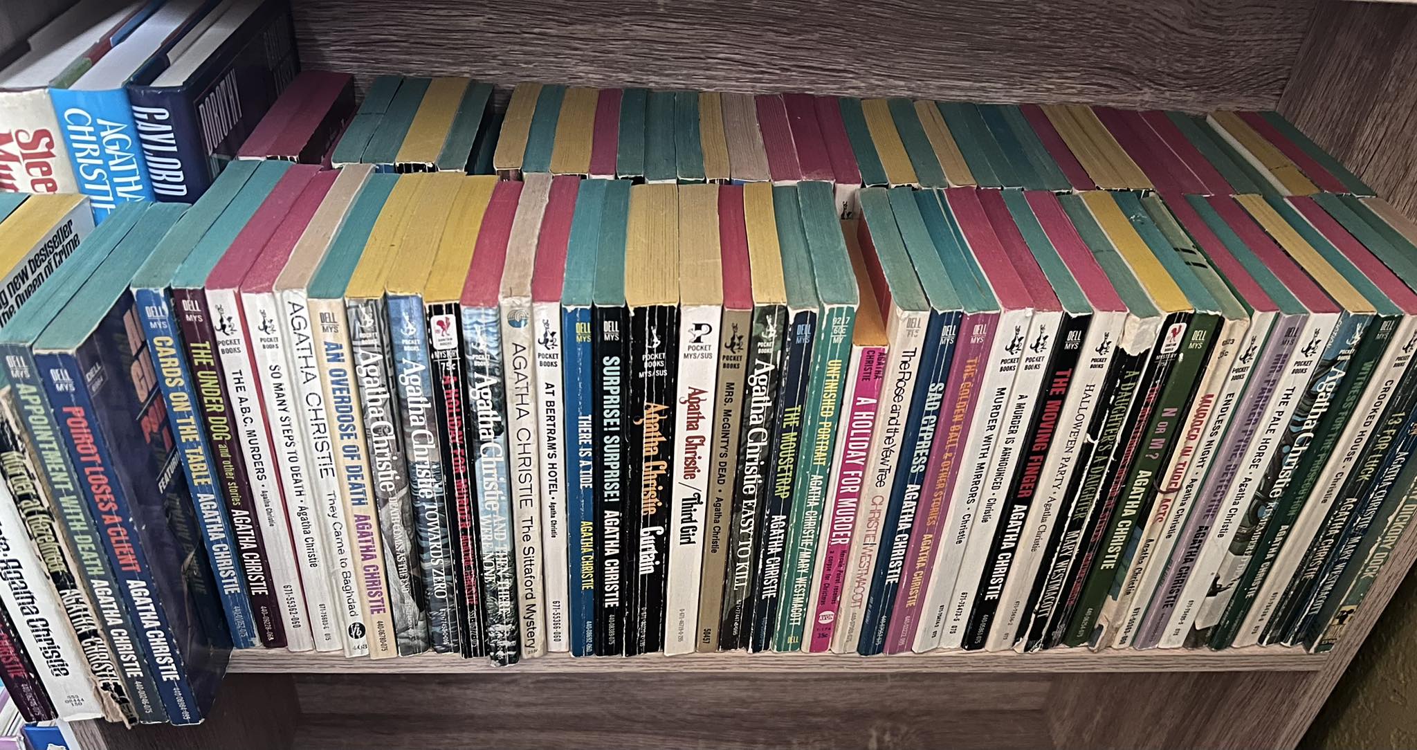 Agatha Christie book collection organized by color