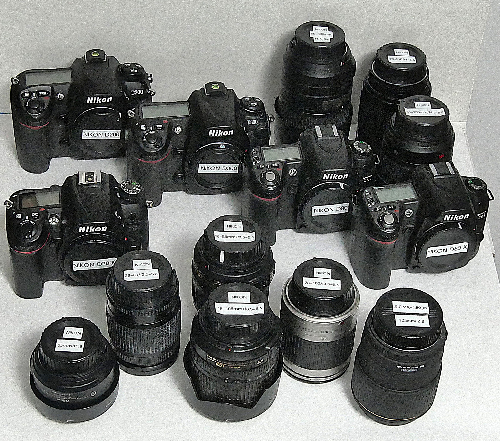 Nikon camera collection with D200, D300, D80, and D7000