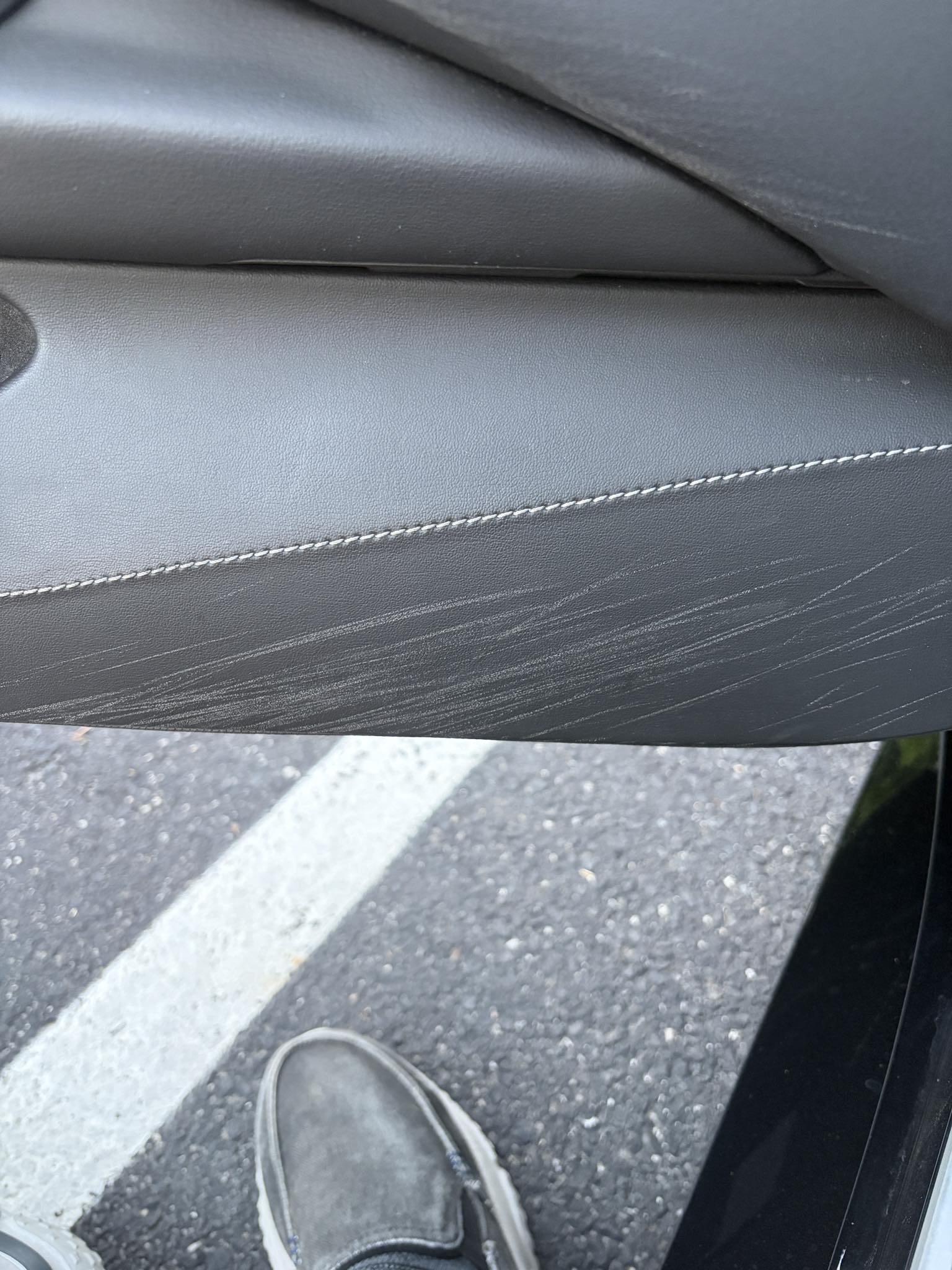 How to fix scratch marks on 2025 C8 Corvette door panels?