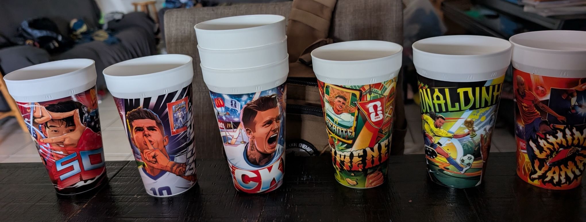 The McDonald's cups feature Christian Pulisic, Ronaldinho Gaucho