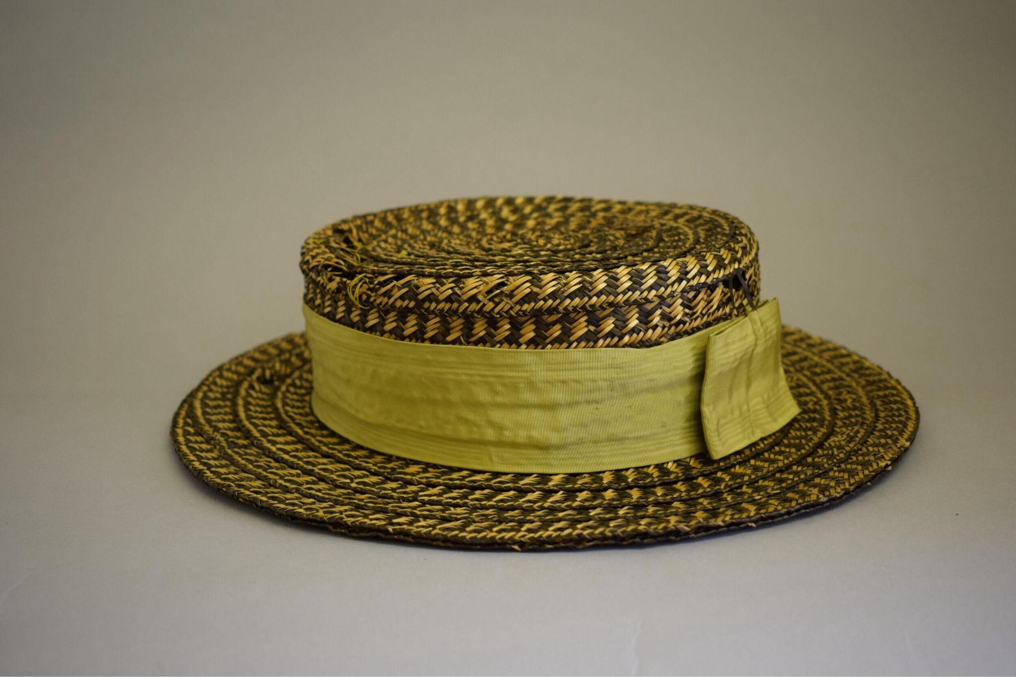 Vintage straw boater hat with green ribbon