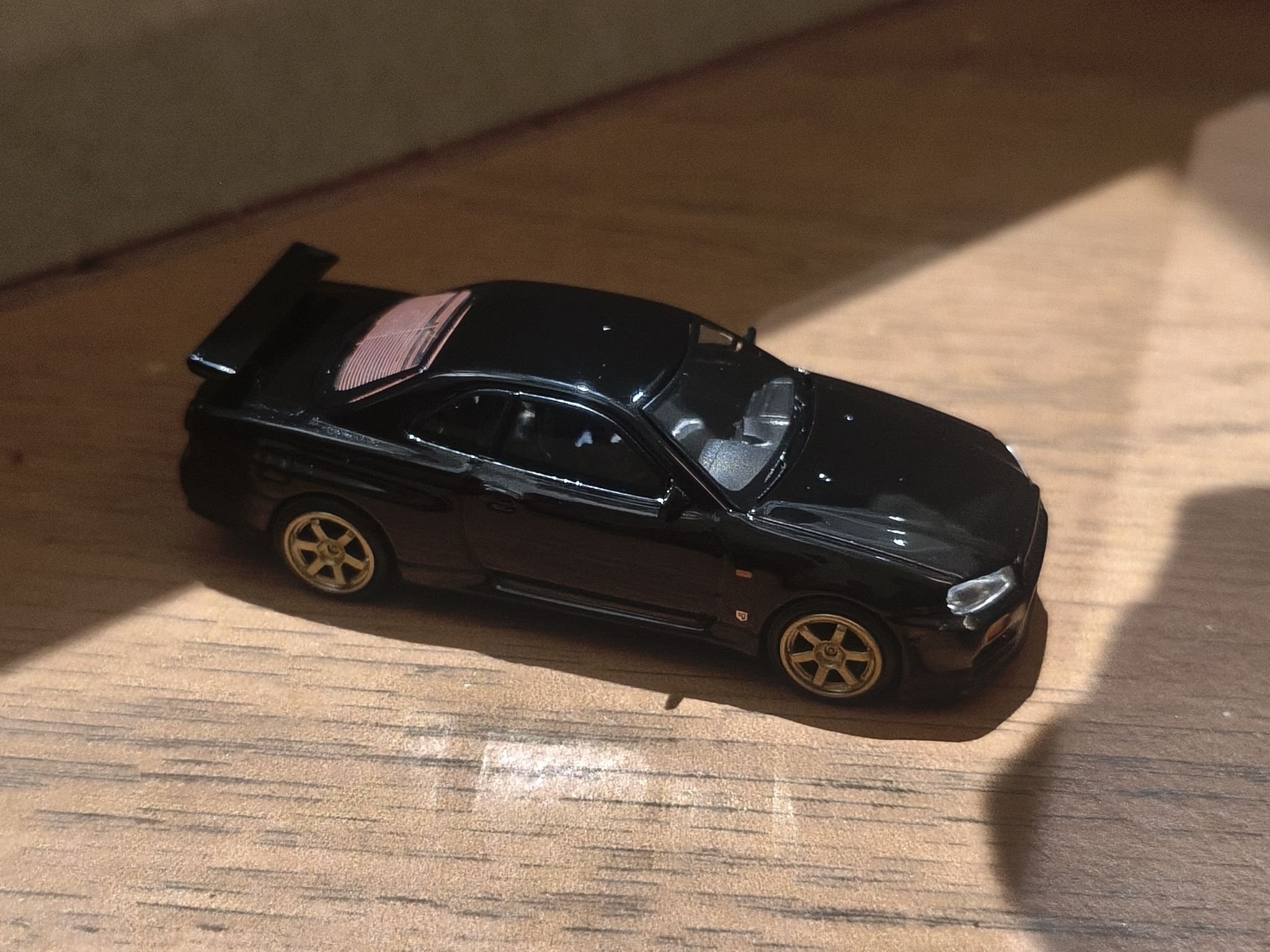 Nissan Skyline GT-R R34 V.Spec Black Pearl diecast model