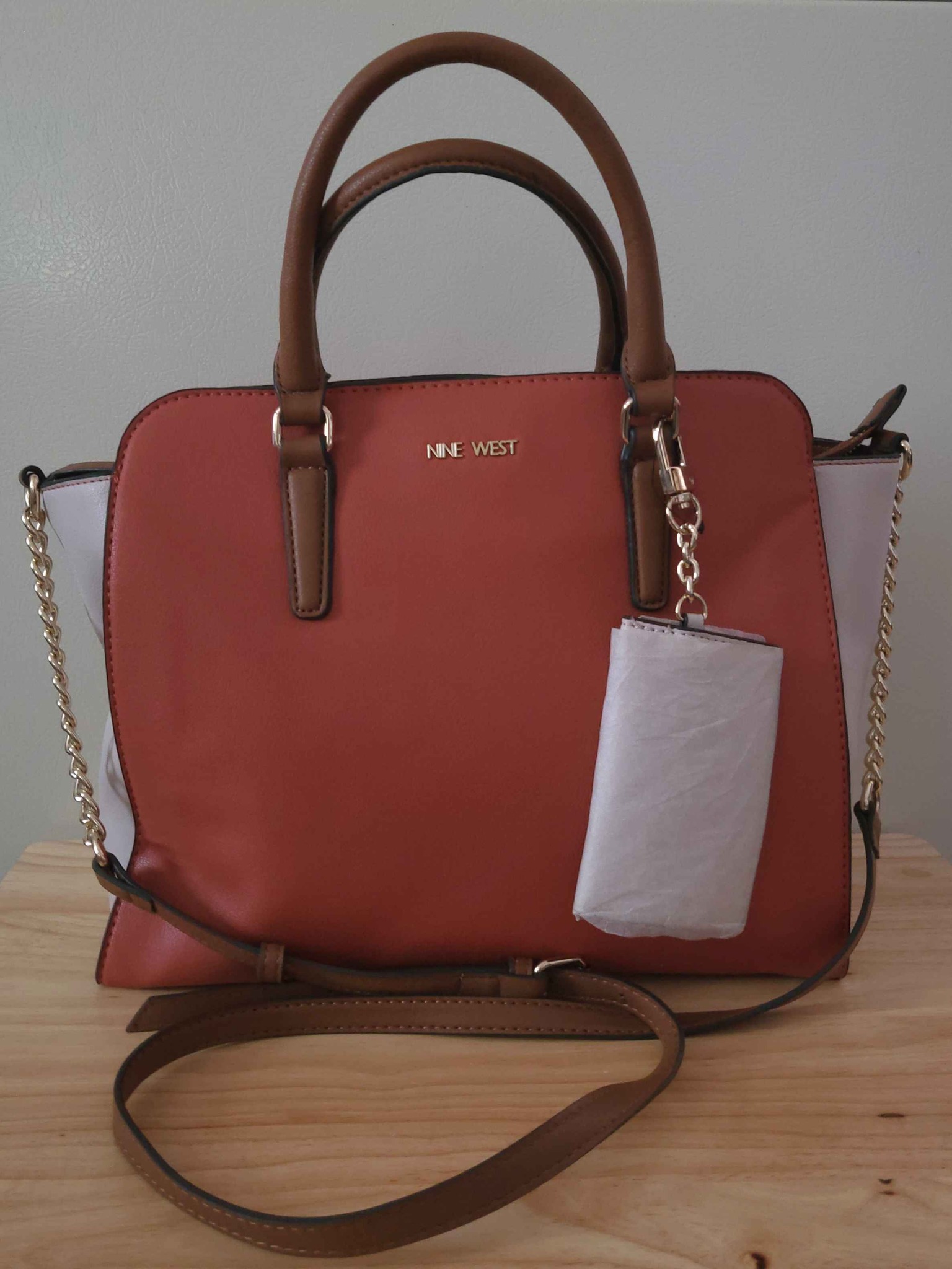 This is a spaccious Nine West Duval multi-color satchel bag