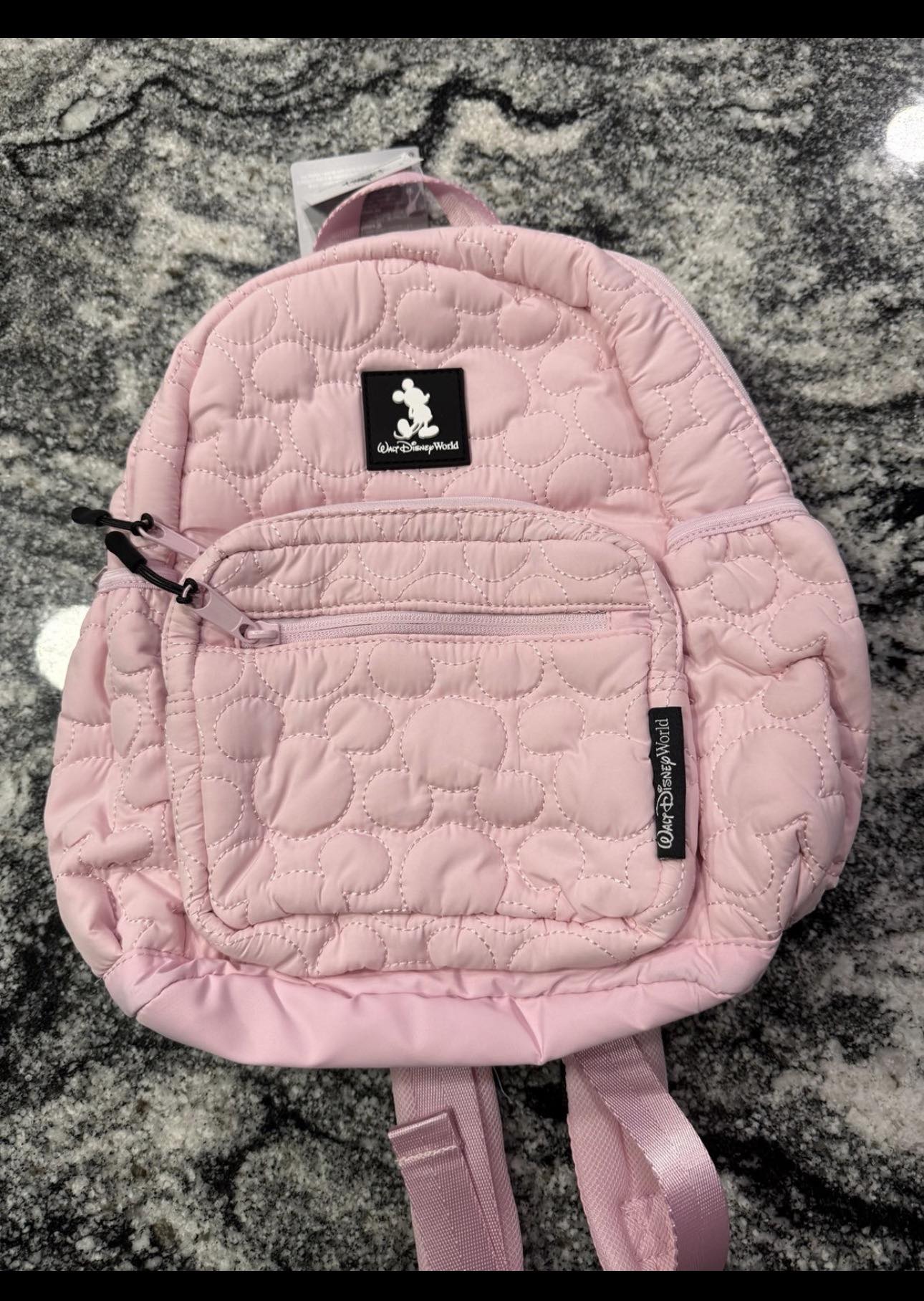 Where to find pink quilted Mickey Mouse backpack at Walt Disney World?