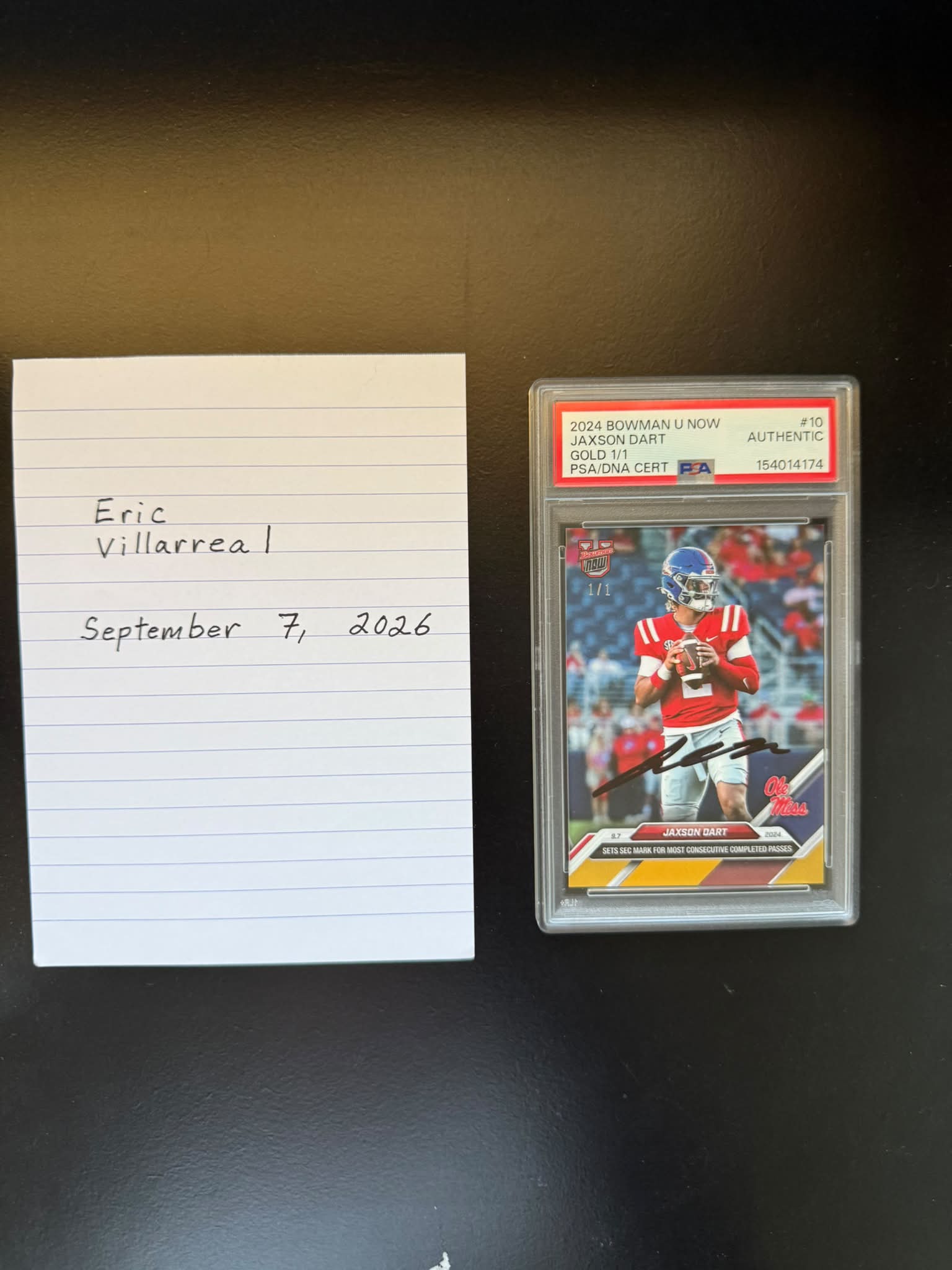 Jaxson Dart wrote 'Darty Party' on his 1/1 autograph in Topps