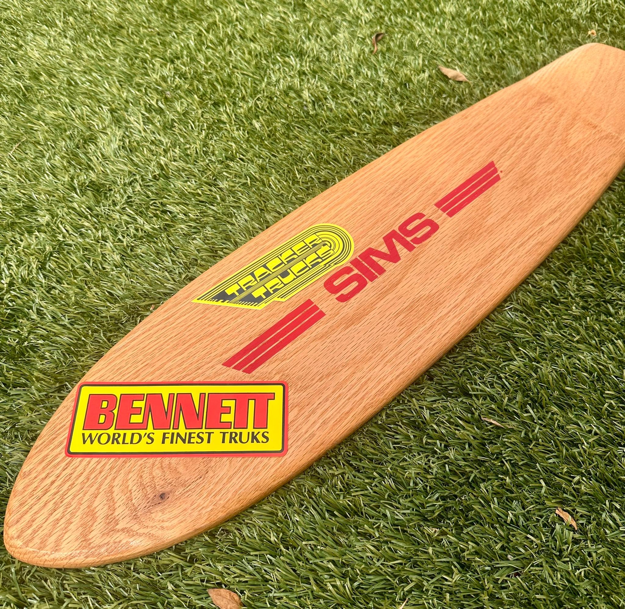 Vintage 1970s skateboard with Sims deck and Powell wheels