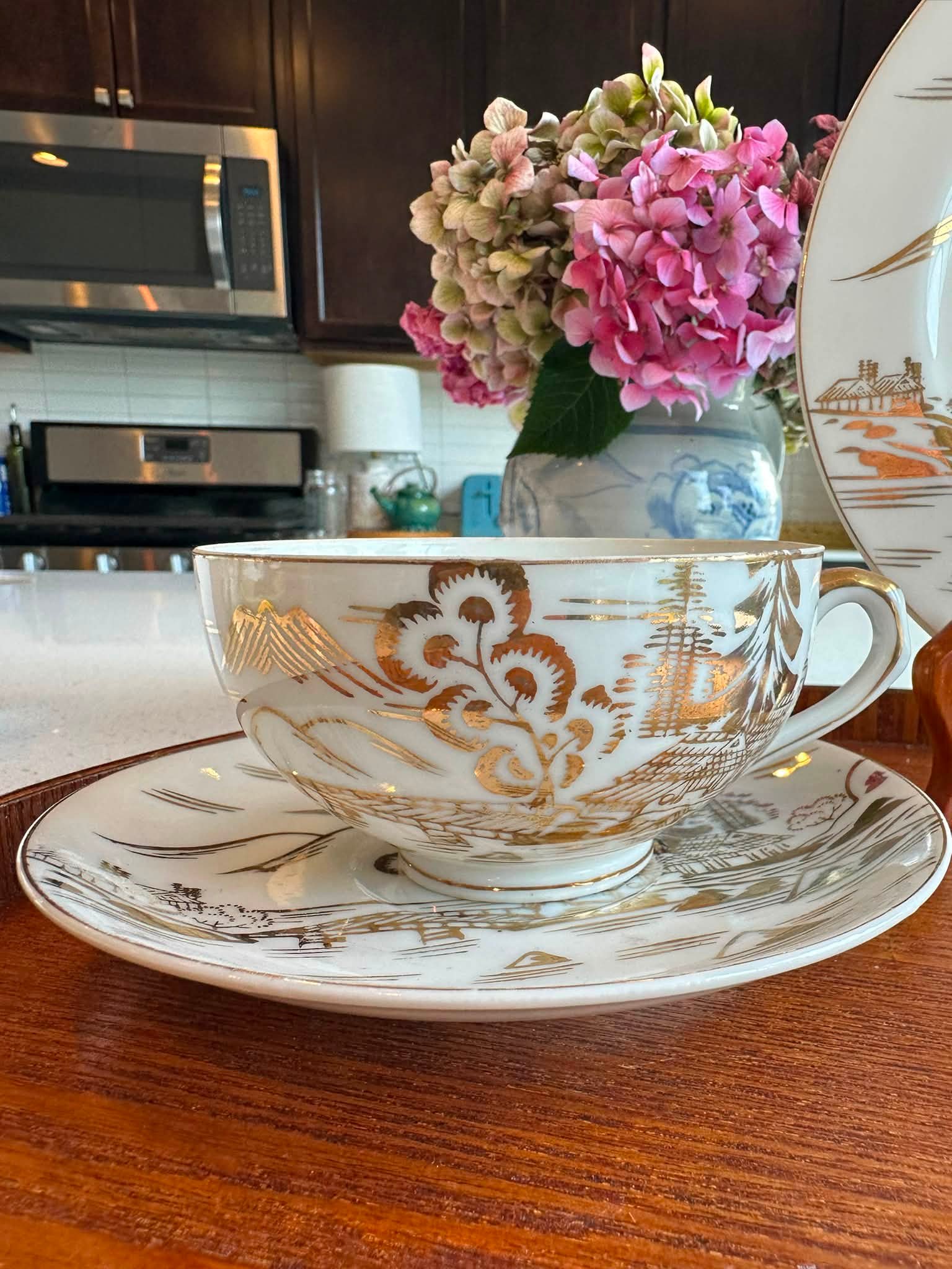 This vintage porcelain saucer from Japan exudes a nostalgic charm