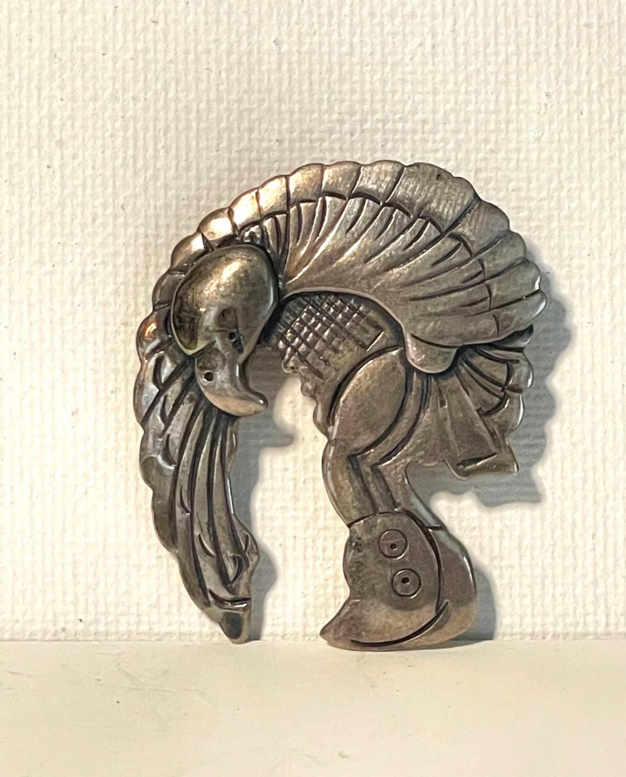 Can someone identify a tribe or origin? I'm not seeing a hallmark.