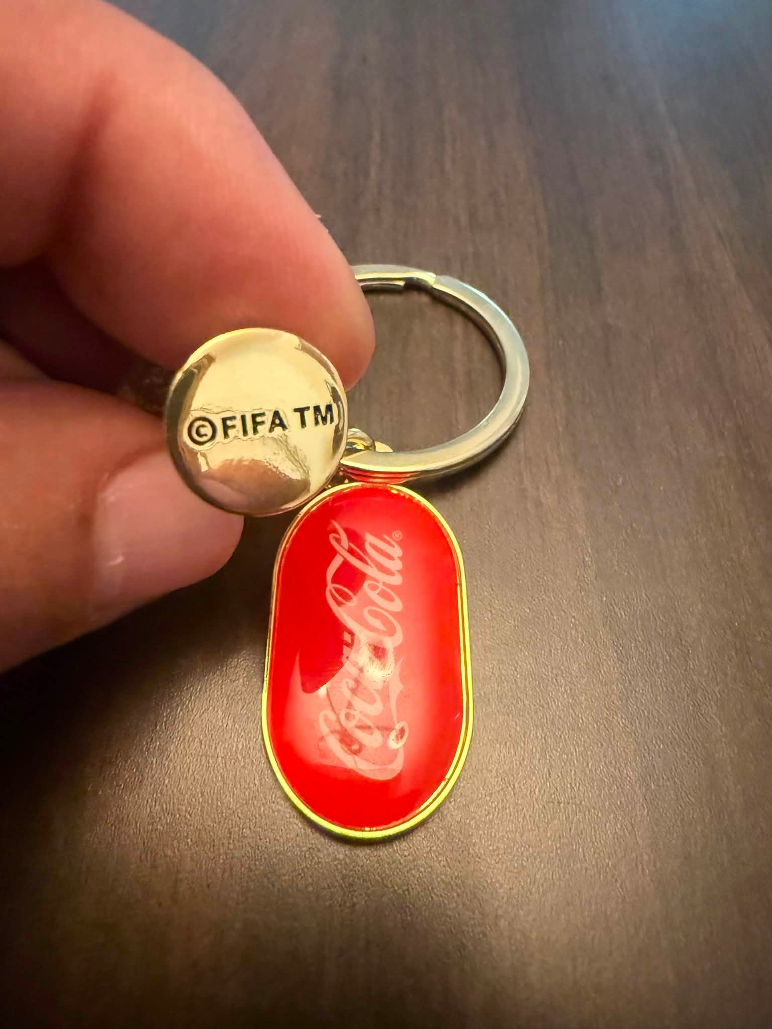 Official FIFA and Coca Cola key chain and bracelet for sale