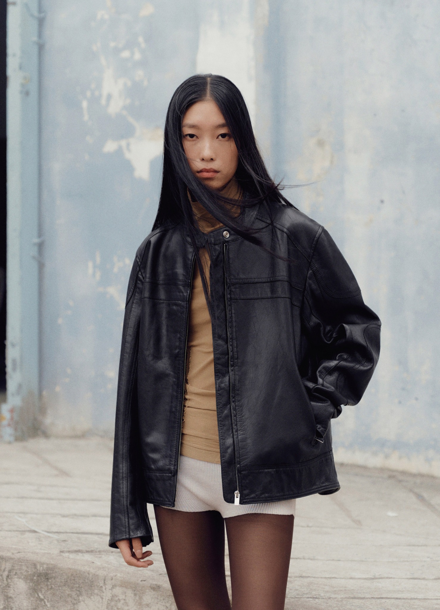 The Moto Jacket – crafted from black leather with a worn-in look 