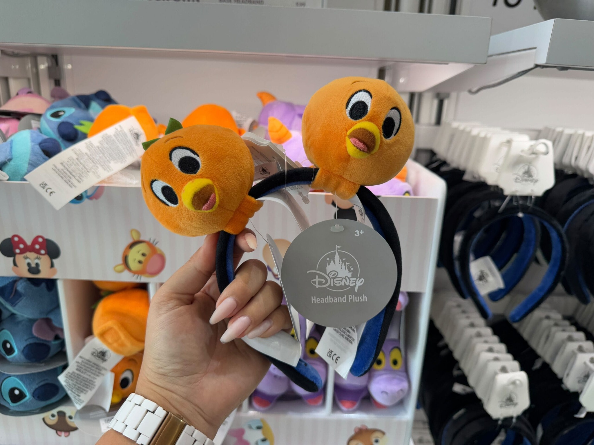 Harveys Orange Bird crossbody bag release at Disney Springs