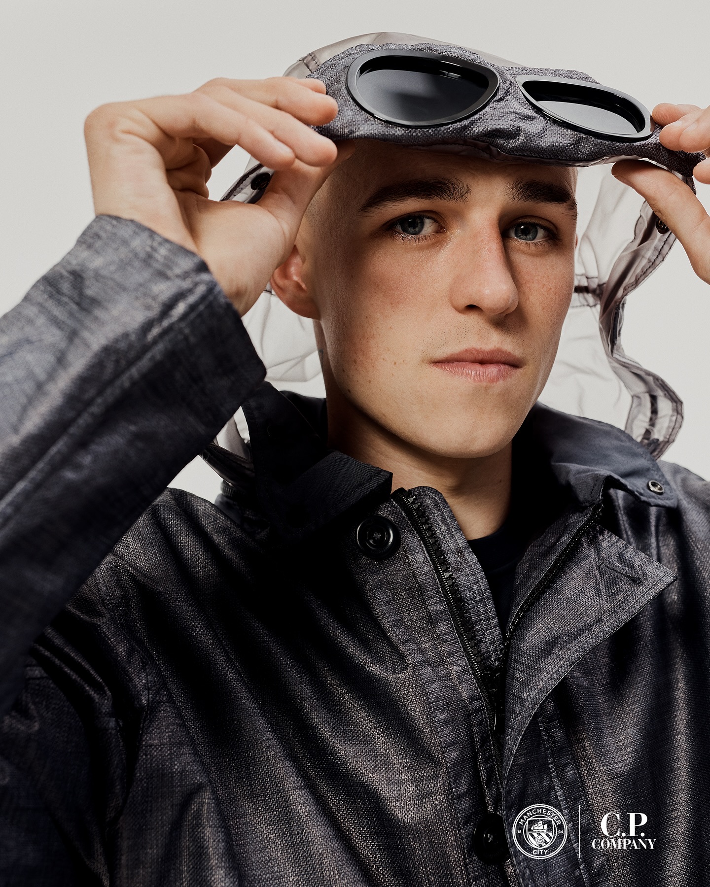 Worn by Manchester City players Aké, Foden, and Doku for the SS025 