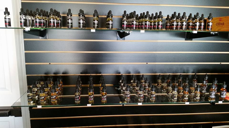 vape shop with tasting bar The Spot Smoke Flavor:Green Mango Uwell Caliburn GK3 Tenet winter-hard