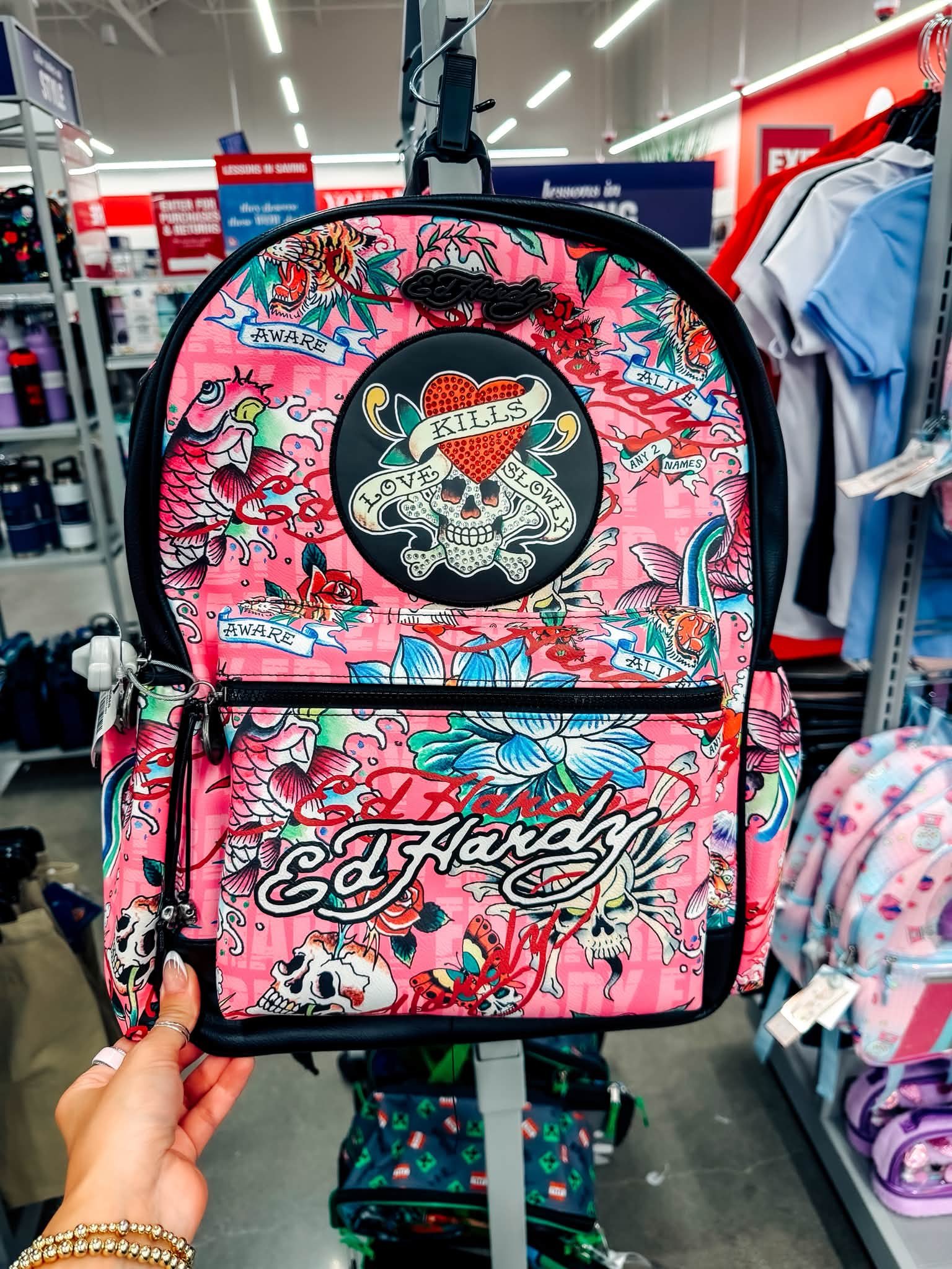 Ed Hardy backpacks are back at Burlington and they are bringing