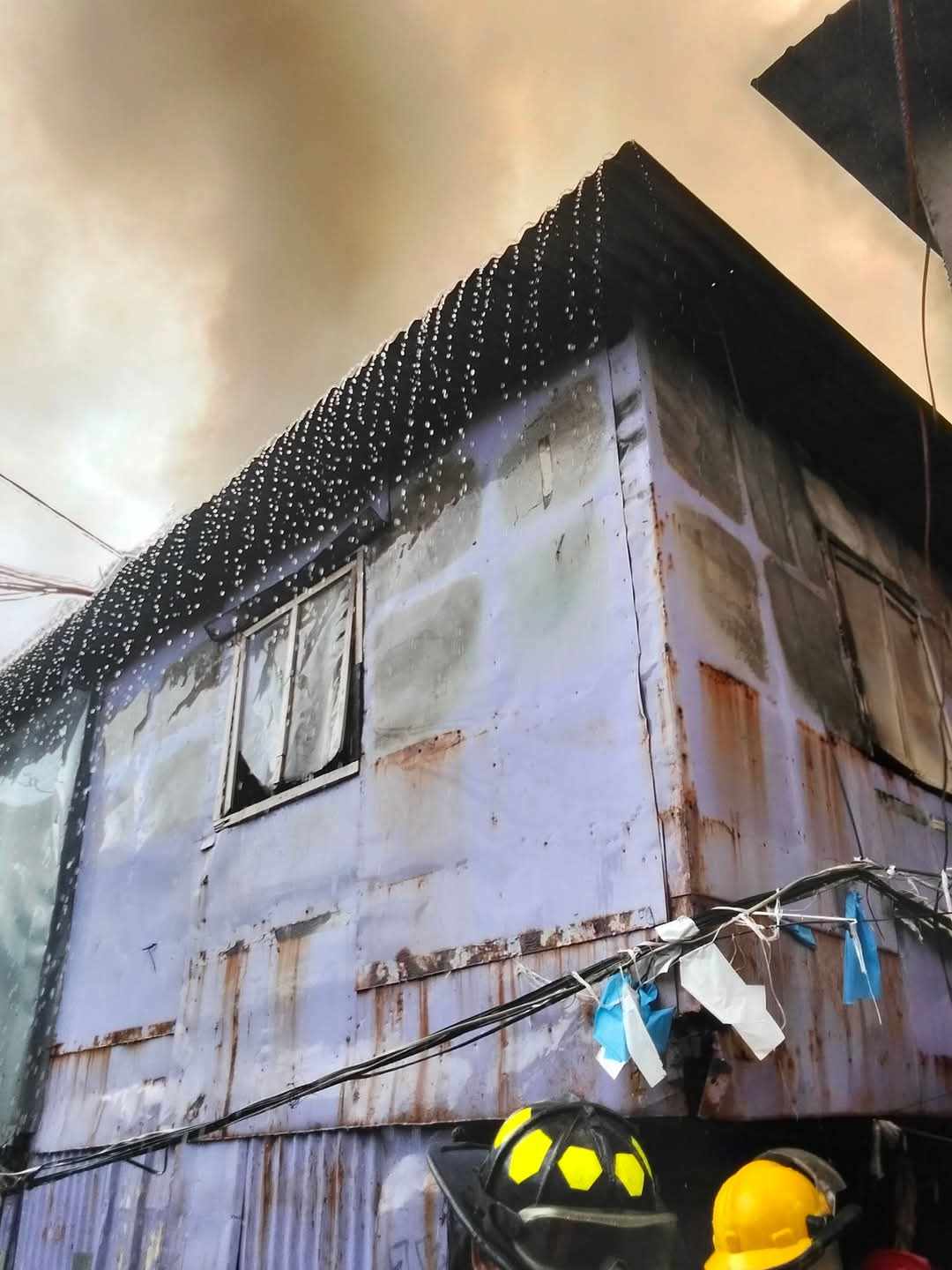 Philippine Star - Firefighters respond to an ongoing fire that hit a ...