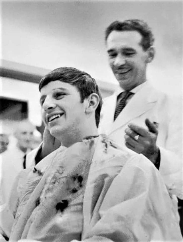On March 25, 1963, photographer Dezo Hoffmann takes photos of the