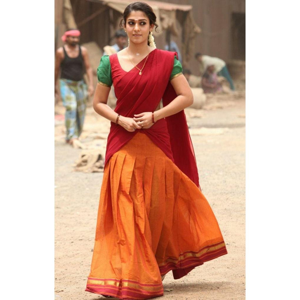 Dear friends This girl is south Indian. Belongs to my community, she wears half saree , before marriage, this is the dress code , girls follow this dress which is traditional