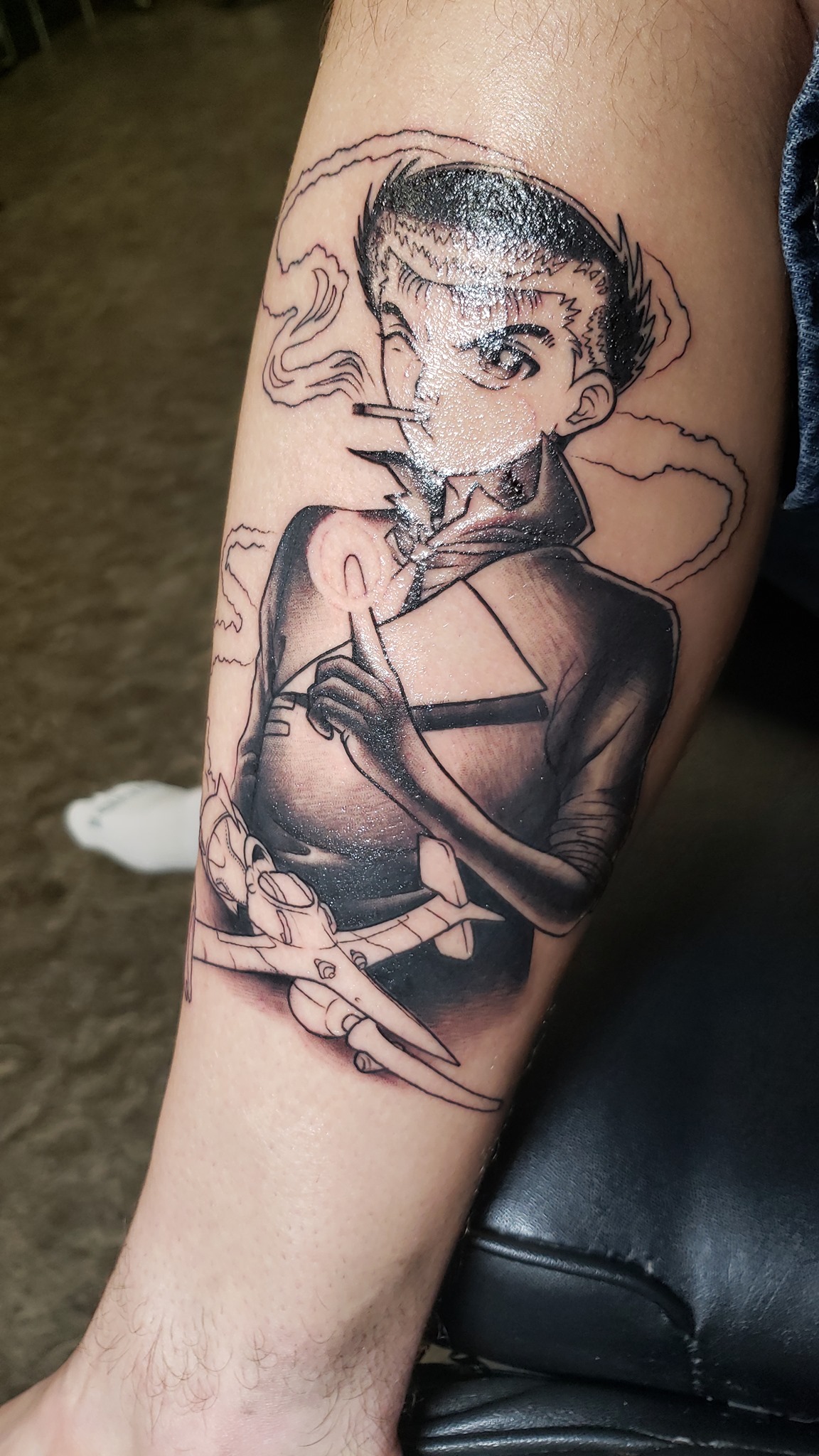 First tattoo! Based on auctioned off toy packaging art by John