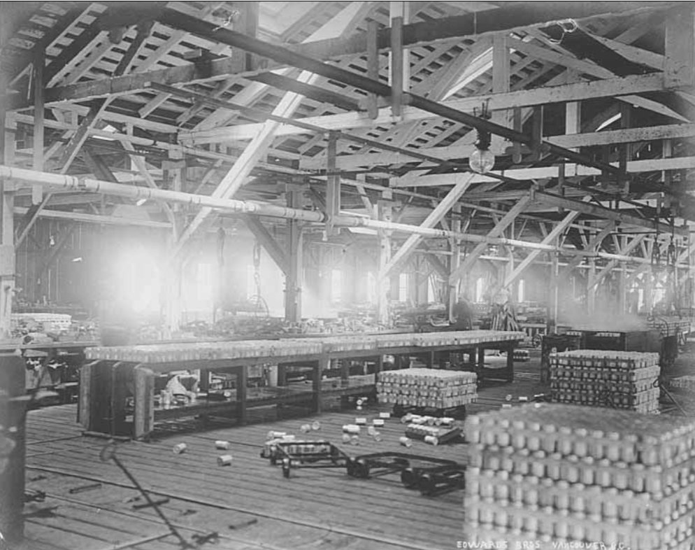 Much - Workroom interior of cannery showing processing machines, tables ...