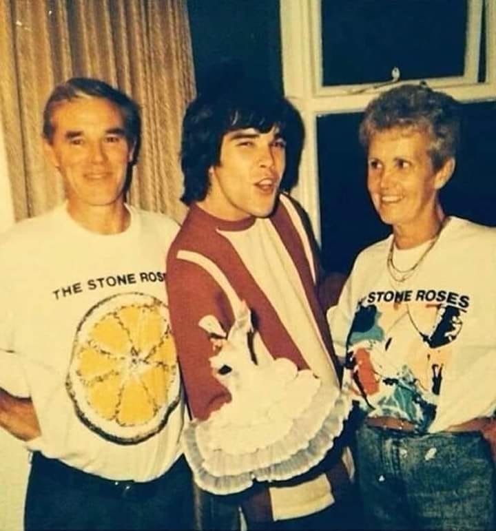 An older Ian Brown in his famous money print t-shirt. Created by