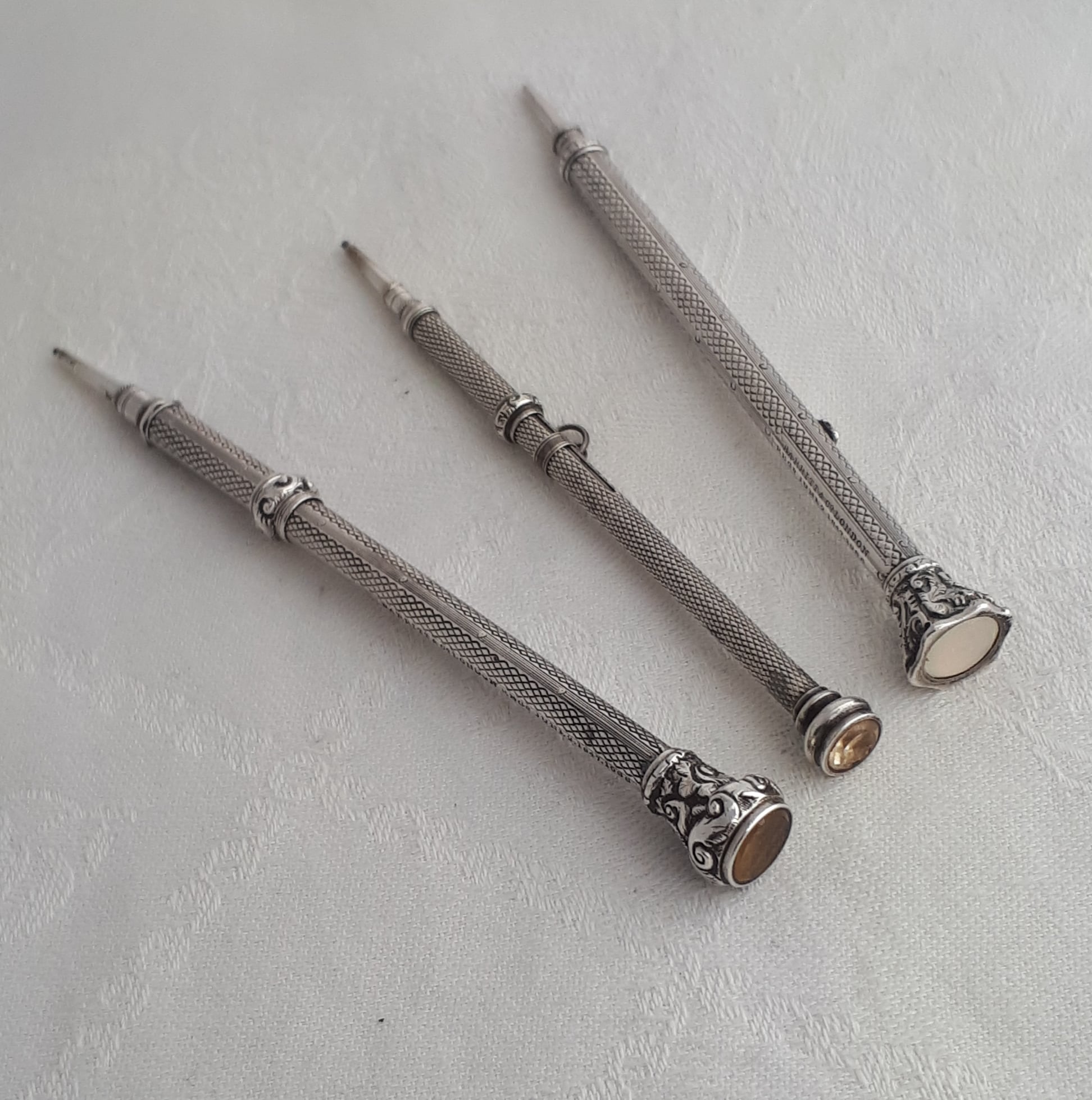 Silver sliding propelling pencils by Barritt & Co