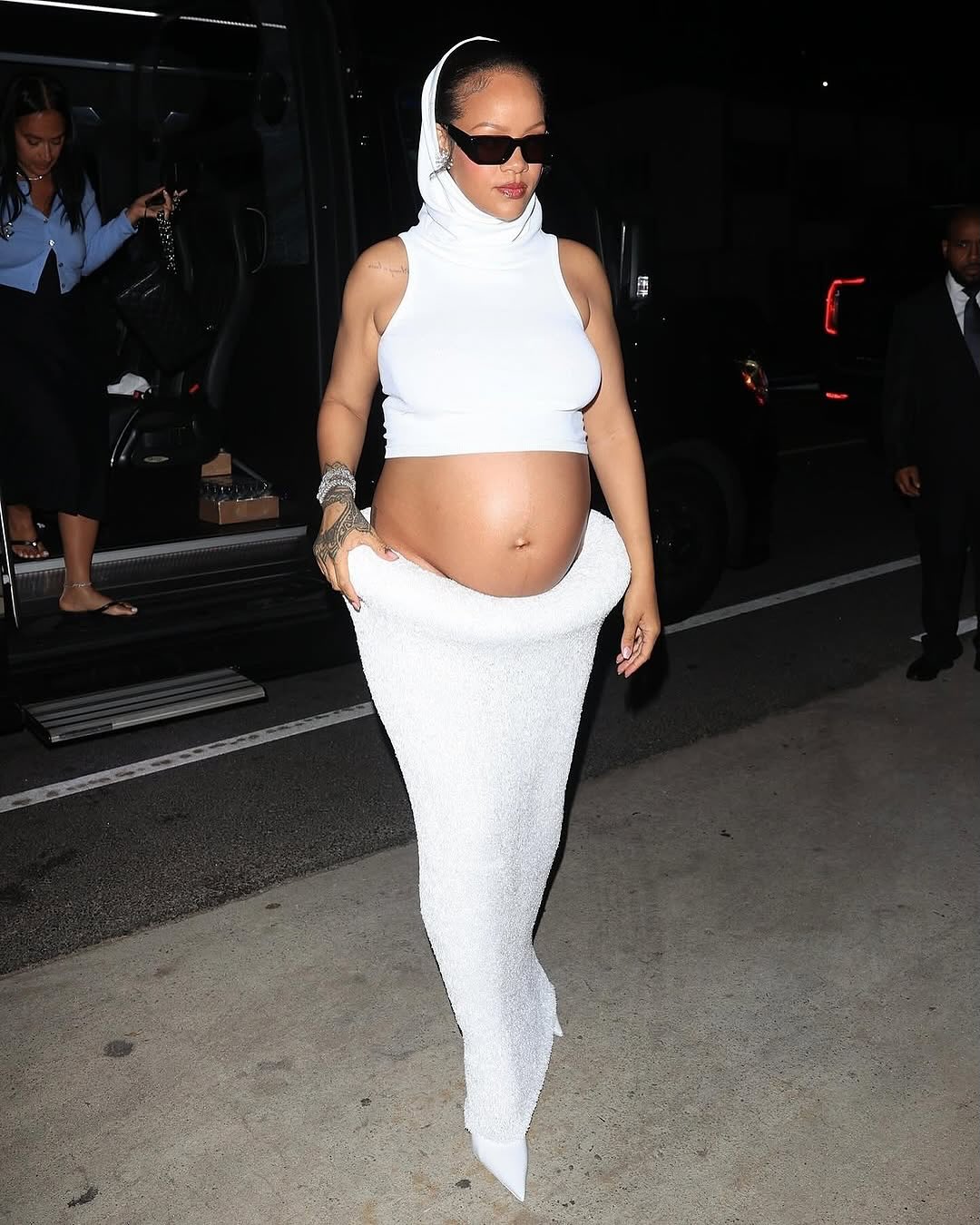 high fashion maternity dresses GraziaFashion Trust Rihanna to turn wear into a high-fashion serve. In a custom all-white Alaïa fit, complete with a dramatic hooded crop and textured skirt, she proved (once again) that pregnancy shimmering navy sequins and beadwork