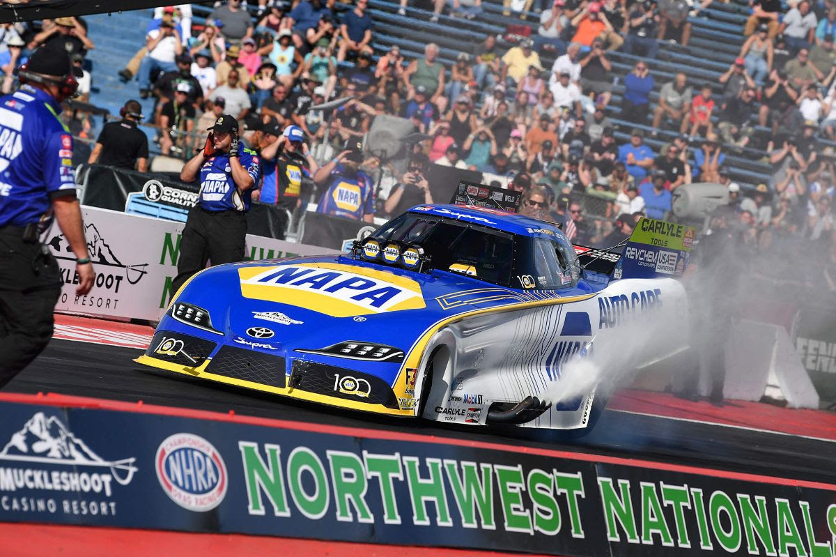 In a historic Top Fuel vs. Funny Car final round between Ron Capps