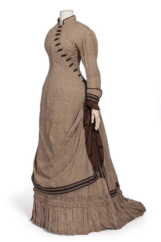 sachin and babi light blue dress Let's skip forward to the 1880s. This day dress is a welcome survivor since  it is the sort of thing that doesn't often make it to a museum. Made of a  striped