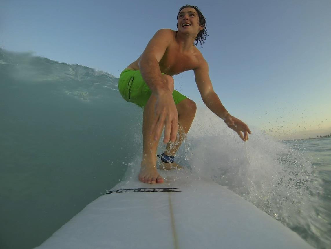 ChatGPT | Can you, put on a Miami beach, holding a surfboard,and ...