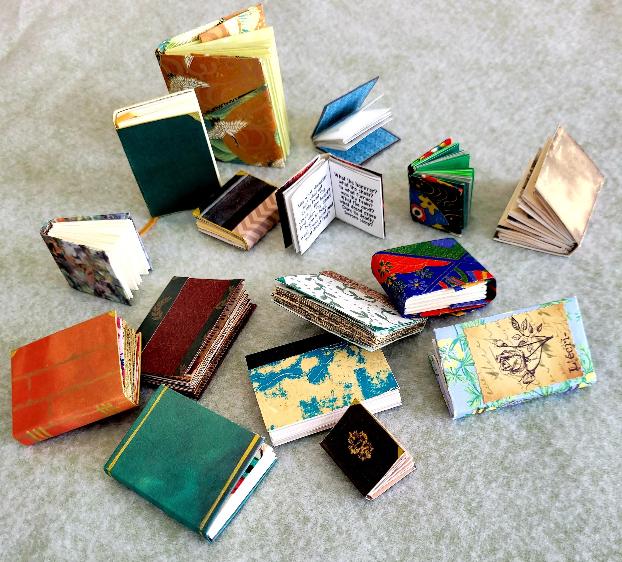 Miniature book versions of normal-size books