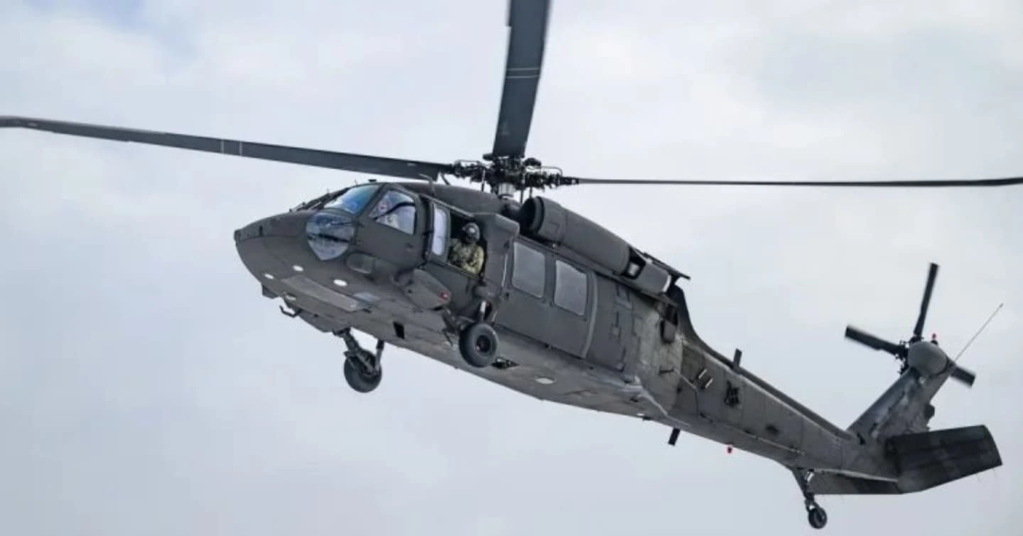 A military helicopter crossed in front of a United Airlines flight