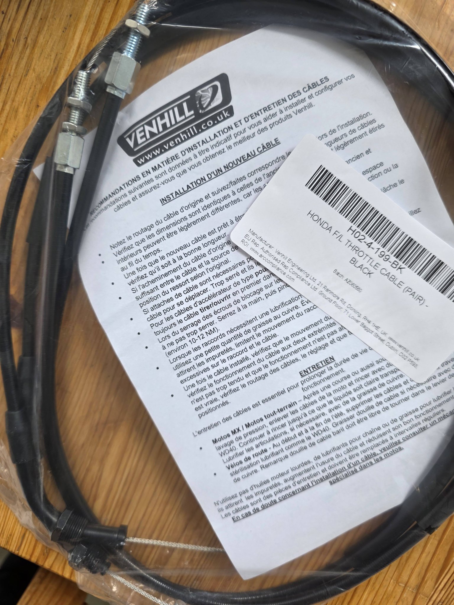 Would someone please post a photo of where the throttle cable