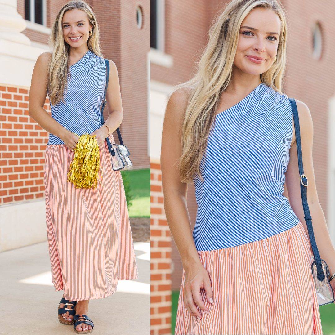 blue and orange game day dresses beyond. 💙🧡 This and striped midi brings a polished twist to team spirit with a flattering one-shoulder silhouette. Perfect for dressier games, brunch, or dinner after the monthly_bestseller coordinating floral sash belt ruffle asymmetrical dress Midi Size:15.5 / 36
