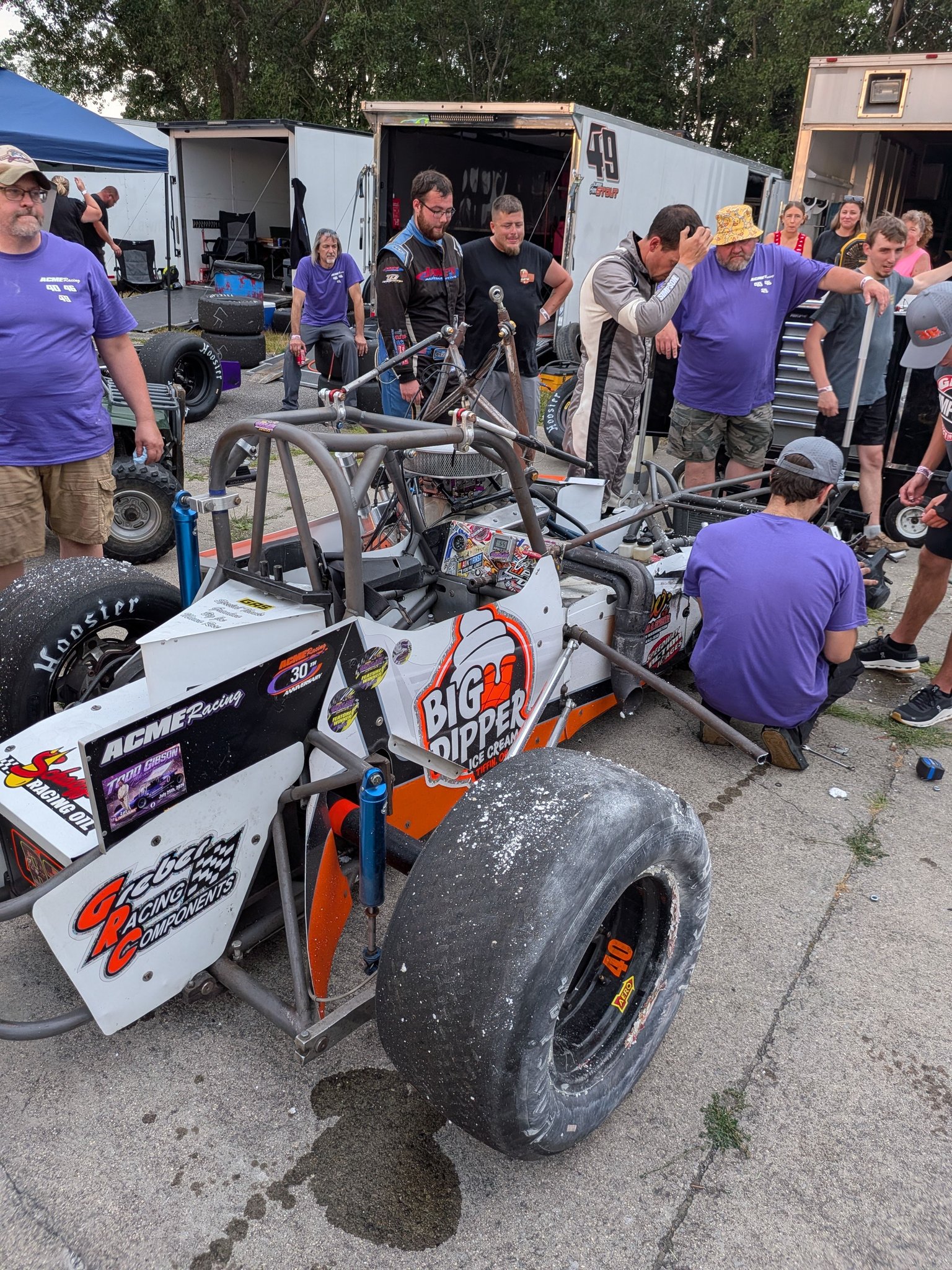 Supermodified sprint car crew encounters turn three wall in JJ